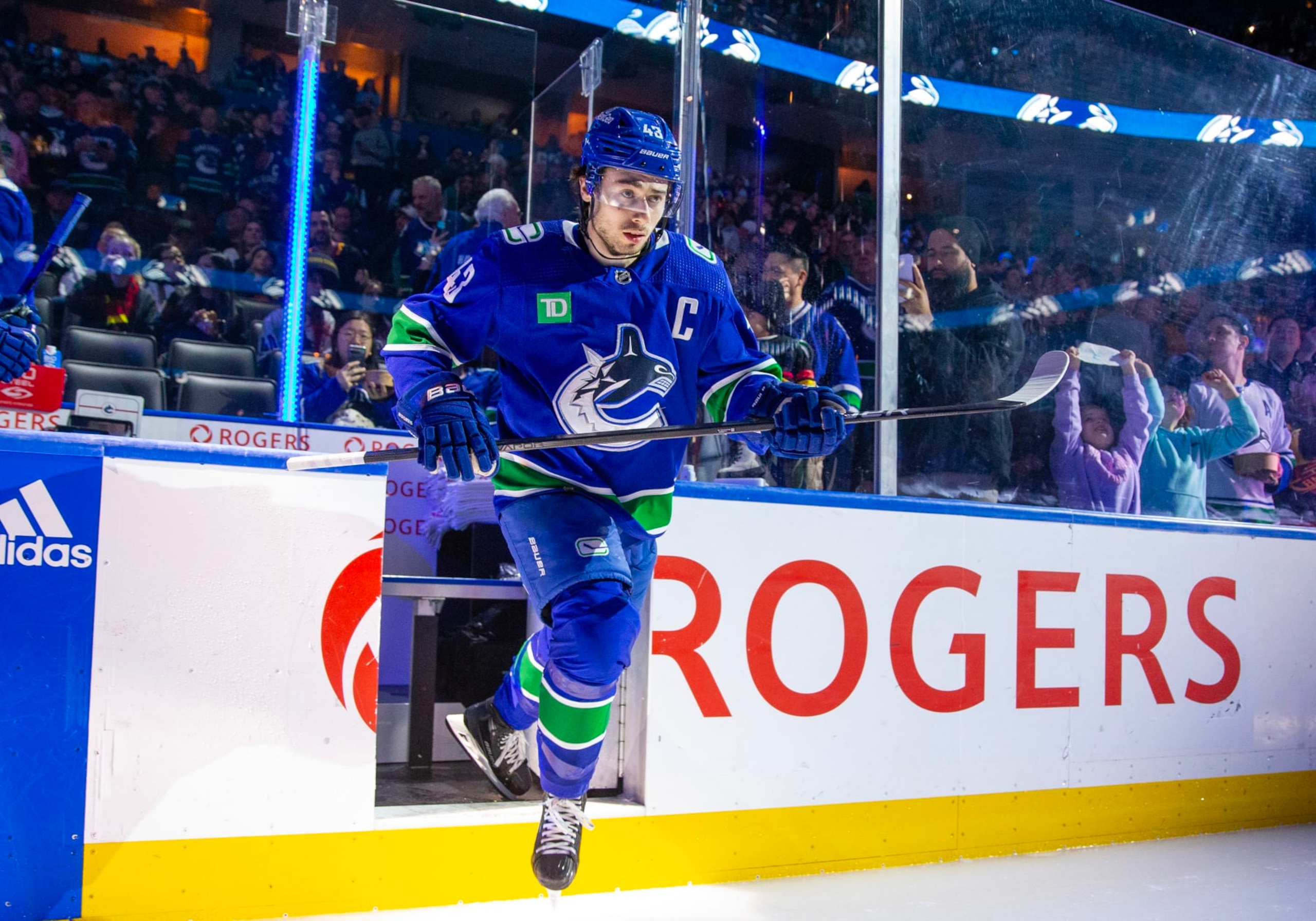 VANCOUVER, CANADA - MARCH 31: Quinn Hughes #43 of the Vancouver Canucks skates onto the ice before their NHL game against the Anaheim Ducks at Rogers Arena on March 31, 2024 in Vancouver, British Columbia, Canada.  (Photo by Jeff Vinnick/NHLI via Getty Images)