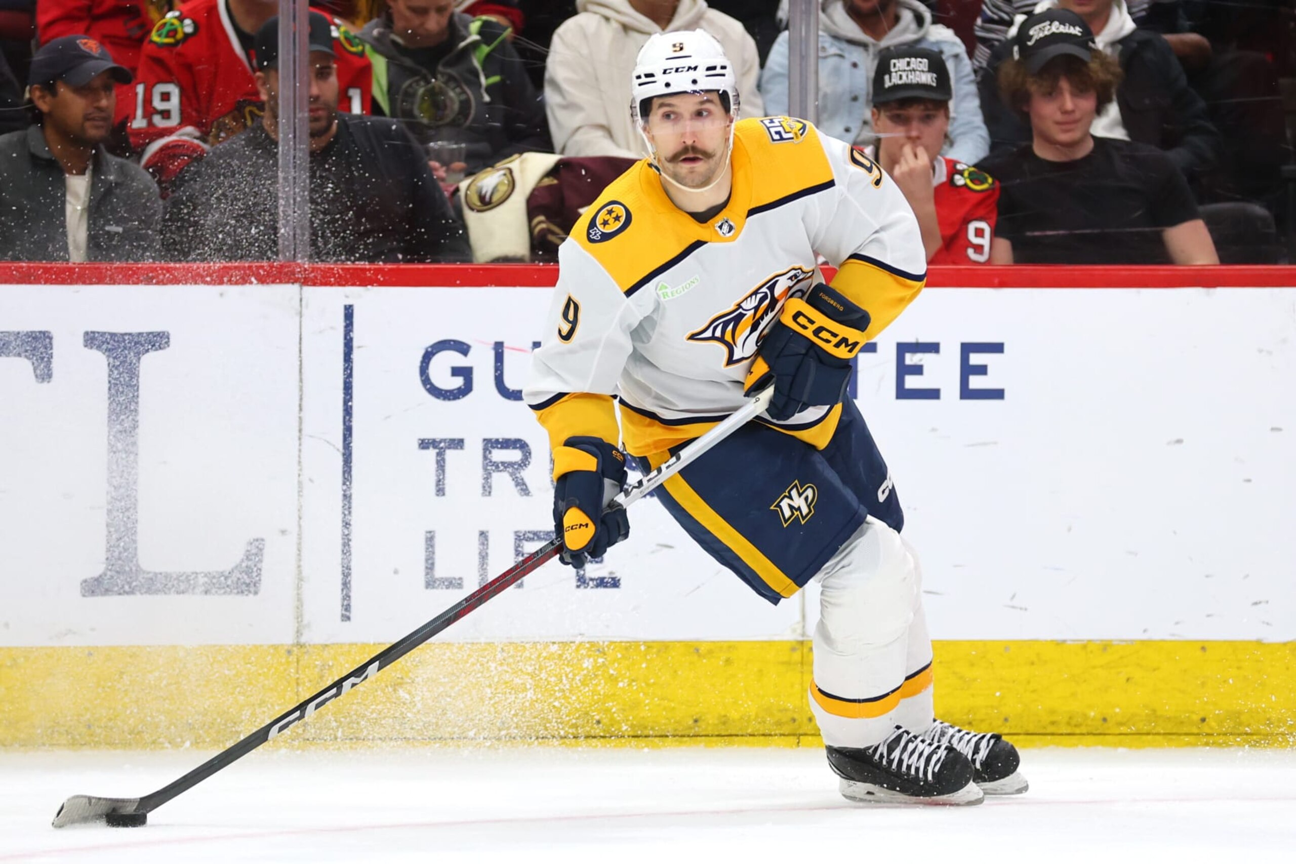 CHICAGO, ILLINOIS - APRIL 12: Filip Forsberg #9 of the Nashville Predators controls the puck against the Chicago Blackhawks during the second period at the United Center on April 12, 2024 in Chicago, Illinois. (Photo by Michael Reaves/Getty Images)