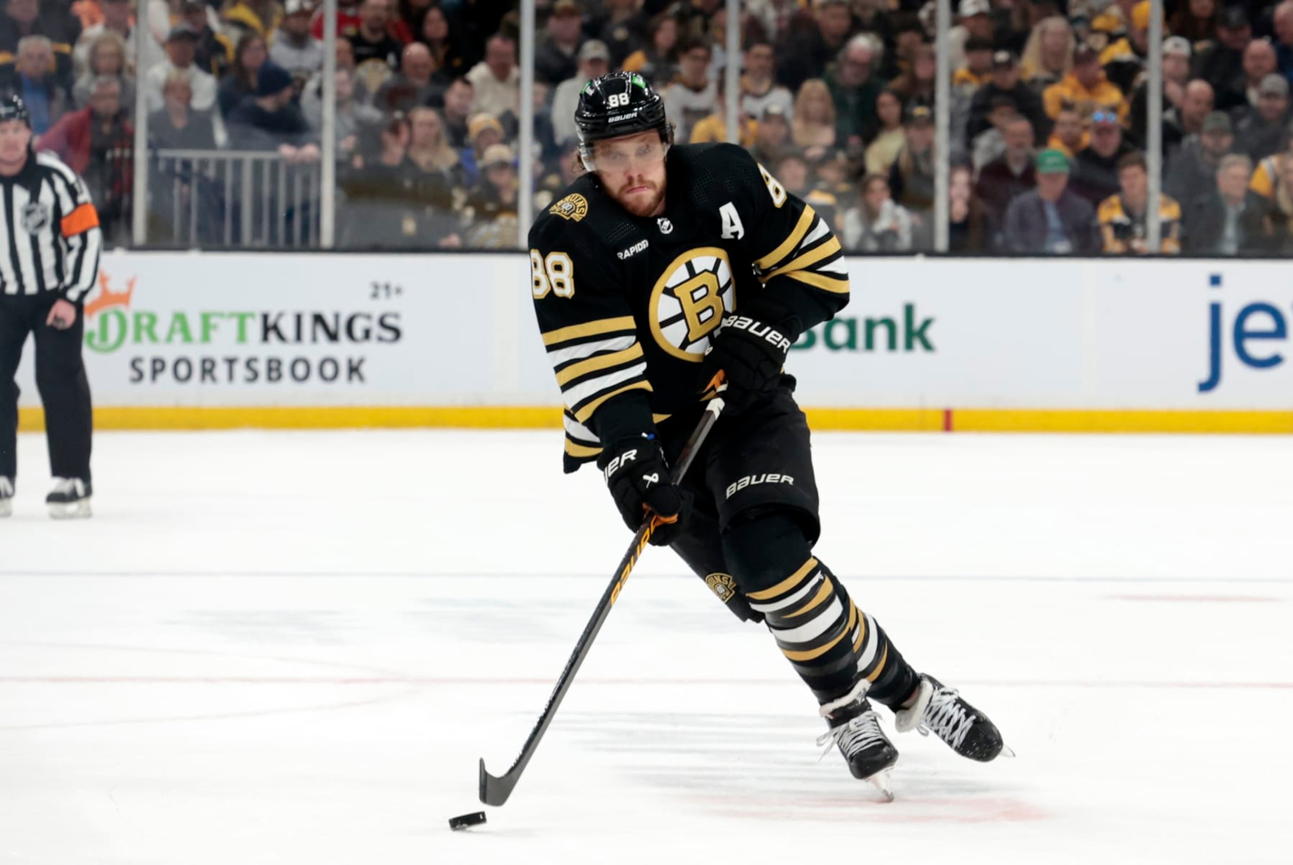 BOSTON, MA - APRIL 06: Boston Bruins right wing David Pastrnak (88) carries the puck during a game between the Boston Bruins and the Florida Panthers on April 6, 2024, at TD Garden in Boston, Massachusetts. (Photo by Fred Kfoury III/Icon Sportswire via Getty Images)