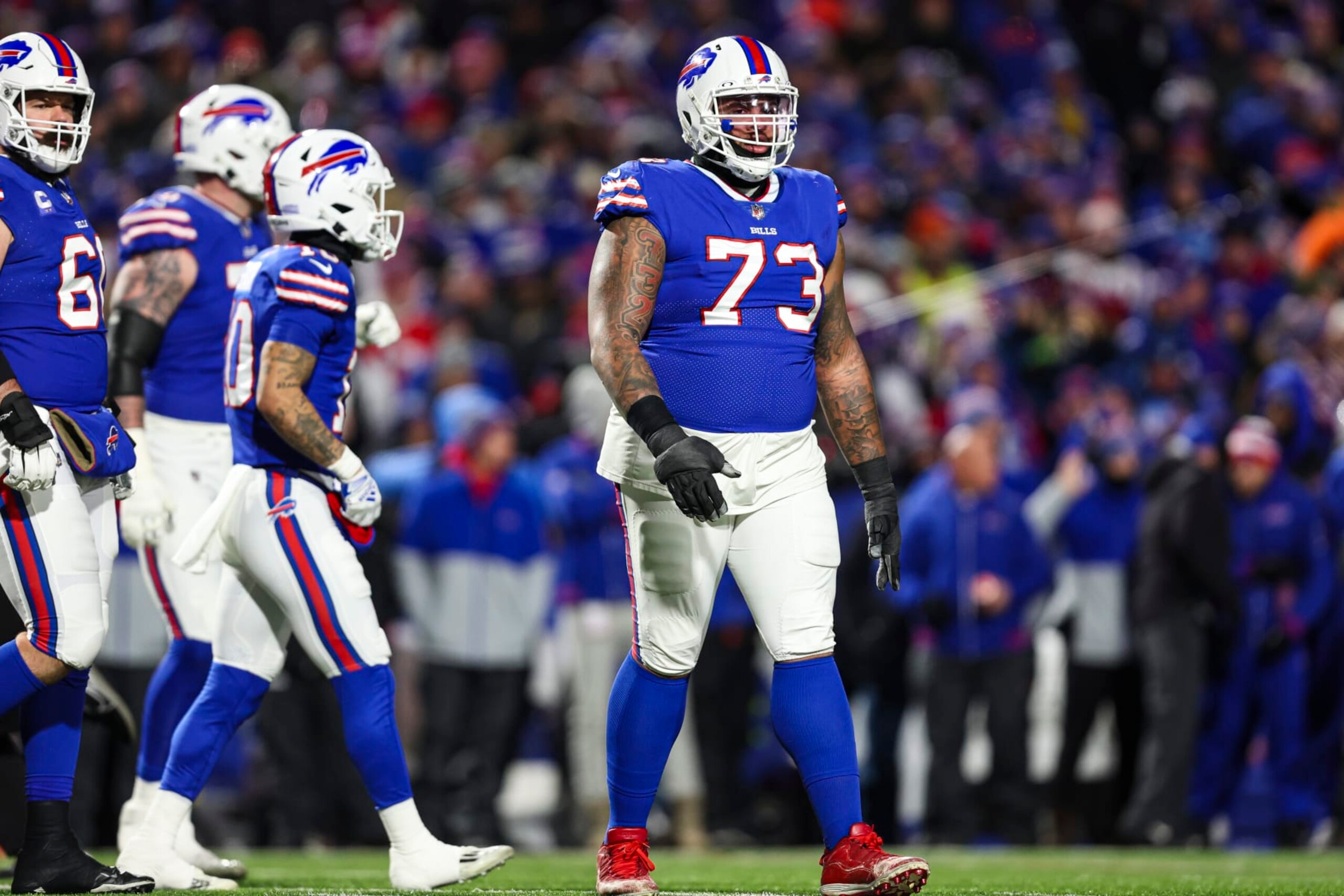ORCHARD PARK, NY - JANUARY 21: Dion Dawkins #73 of the Buffalo Bills looks on from the field during an NFL divisional round playoff football game against the Kansas City Chiefs at Highmark Stadium on January 21, 2024 in Orchard Park, New York. (Photo by Perry Knotts/Getty Images)