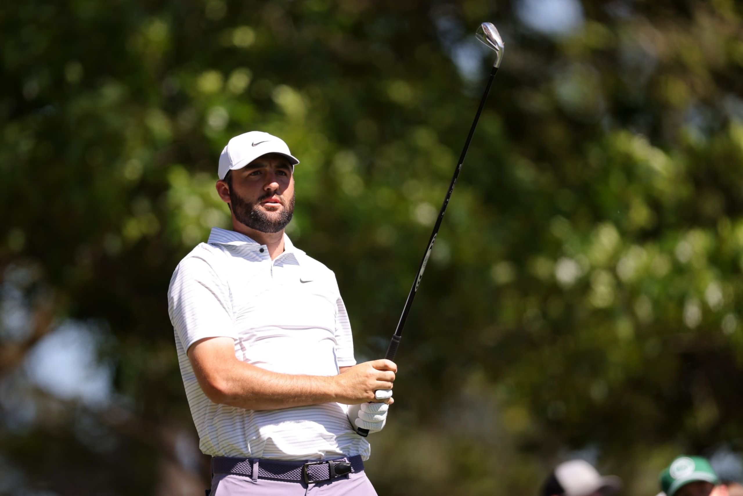 AUGUSTA, GEORGIA - APRIL 13: Scottie Scheffler of the United States follows his shot from the fourth tee during the third round of the 2024 Masters Tournament at Augusta National Golf Club on April 13, 2024 in Augusta, Georgia. (Photo by Jamie Squire/Getty Images) (Photo by Jamie Squire/Getty Images)