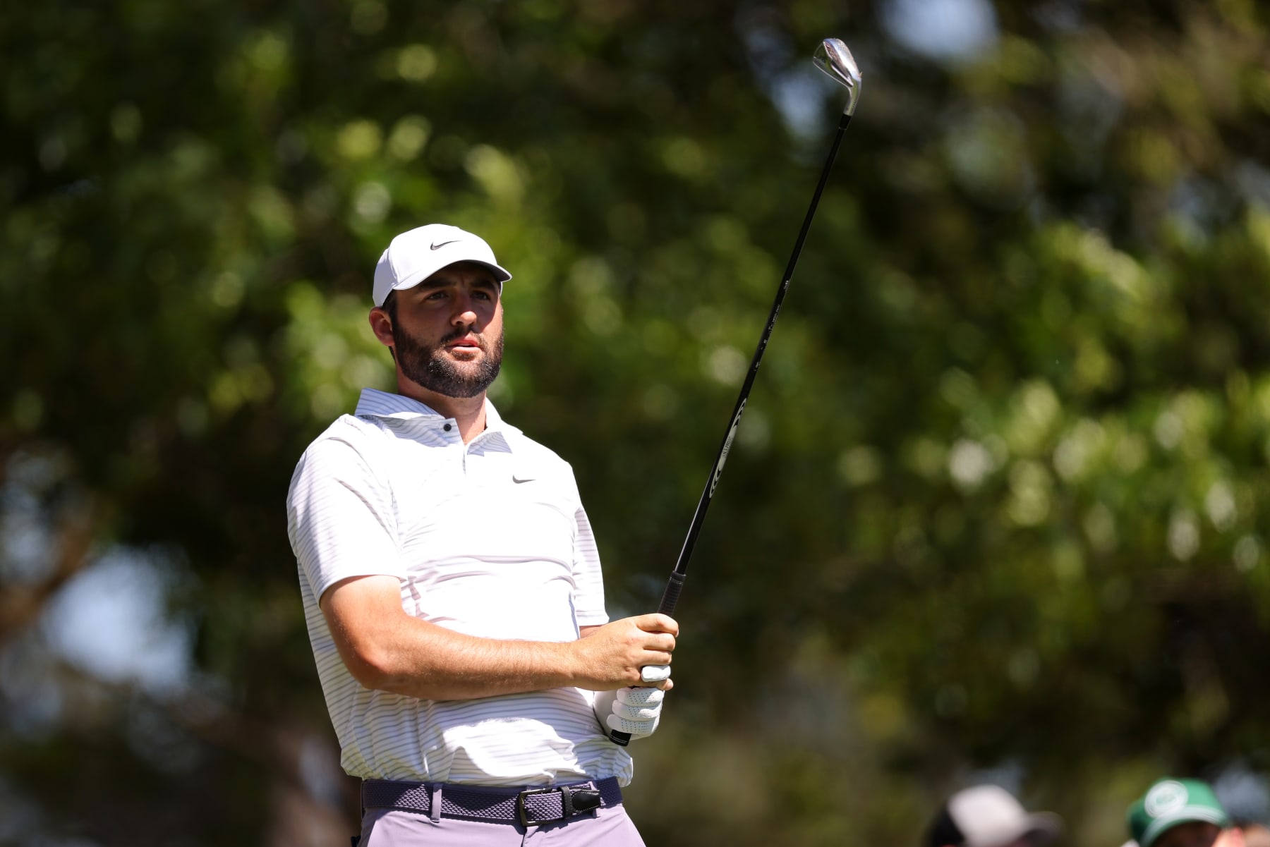 AUGUSTA, GEORGIA - APRIL 13: Scottie Scheffler of the United States follows his shot from the fourth tee during the third round of the 2024 Masters Tournament at Augusta National Golf Club on April 13, 2024 in Augusta, Georgia. (Photo by Jamie Squire/Getty Images) (Photo by Jamie Squire/Getty Images)