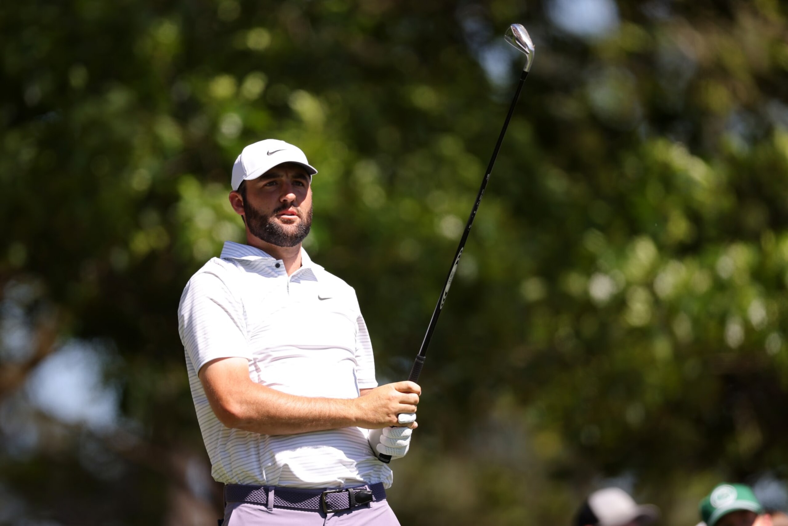 AUGUSTA, GEORGIA - APRIL 13: Scottie Scheffler of the United States follows his shot from the fourth tee during the third round of the 2024 Masters Tournament at Augusta National Golf Club on April 13, 2024 in Augusta, Georgia. (Photo by Jamie Squire/Getty Images) (Photo by Jamie Squire/Getty Images)