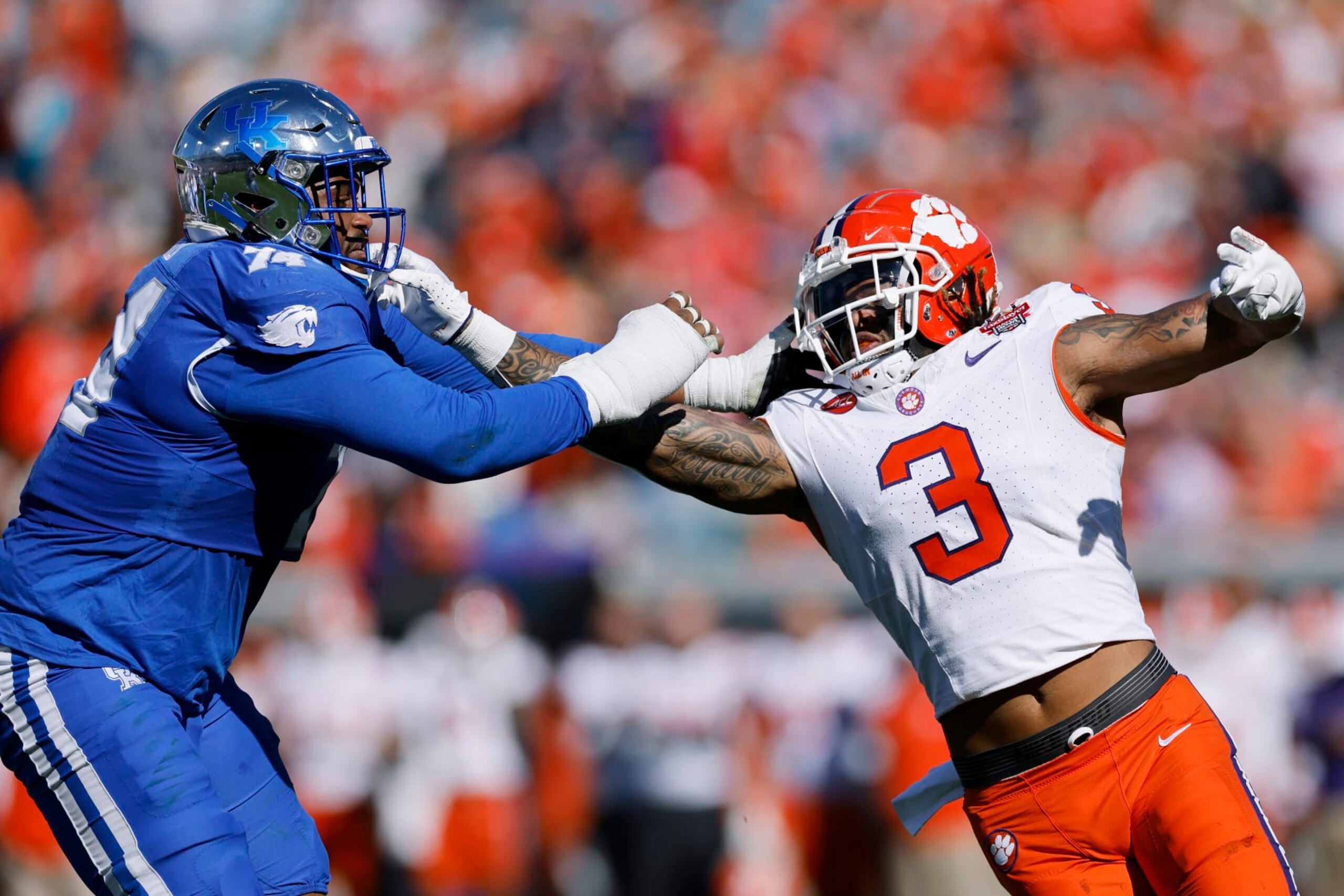 JACKSONVILLE, FL - DECEMBER 29: Clemson Tigers defensive end Xavier Thomas (3) rushes on defense against Kentucky Wildcats offensive lineman Courtland Ford (74) during the TaxSlayer Gator Bowl on December 29, 2023 at EverBank Stadium in Jacksonville, Florida. (Photo by Joe Robbins/Icon Sportswire via Getty Images) JACKSONVILLE, FL - DECEMBER 29: Clemson Tigers defensive end Xavier Thomas (3) rushes on defense against Kentucky Wildcats offensive lineman Courtland Ford (74) during the TaxSlayer Gator Bowl on December 29, 2023 at EverBank Stadium in Jacksonville, Florida. (Photo by Joe Robbins/Icon Sportswire via Getty Images)