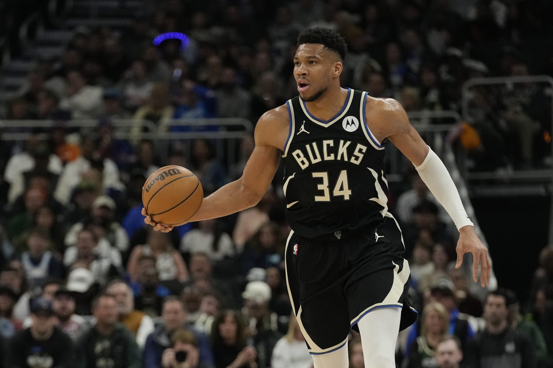 MILWAUKEE, WISCONSIN - APRIL 07: Giannis Antetokounmpo #34 of the Milwaukee Bucks dribbles the ball during the first half against the New York Knicks at Fiserv Forum on April 07, 2024 in Milwaukee, Wisconsin. NOTE TO USER: User expressly acknowledges and agrees that, by downloading and or using this photograph, User is consenting to the terms and conditions of the Getty Images License Agreement. (Photo by Patrick McDermott/Getty Images)