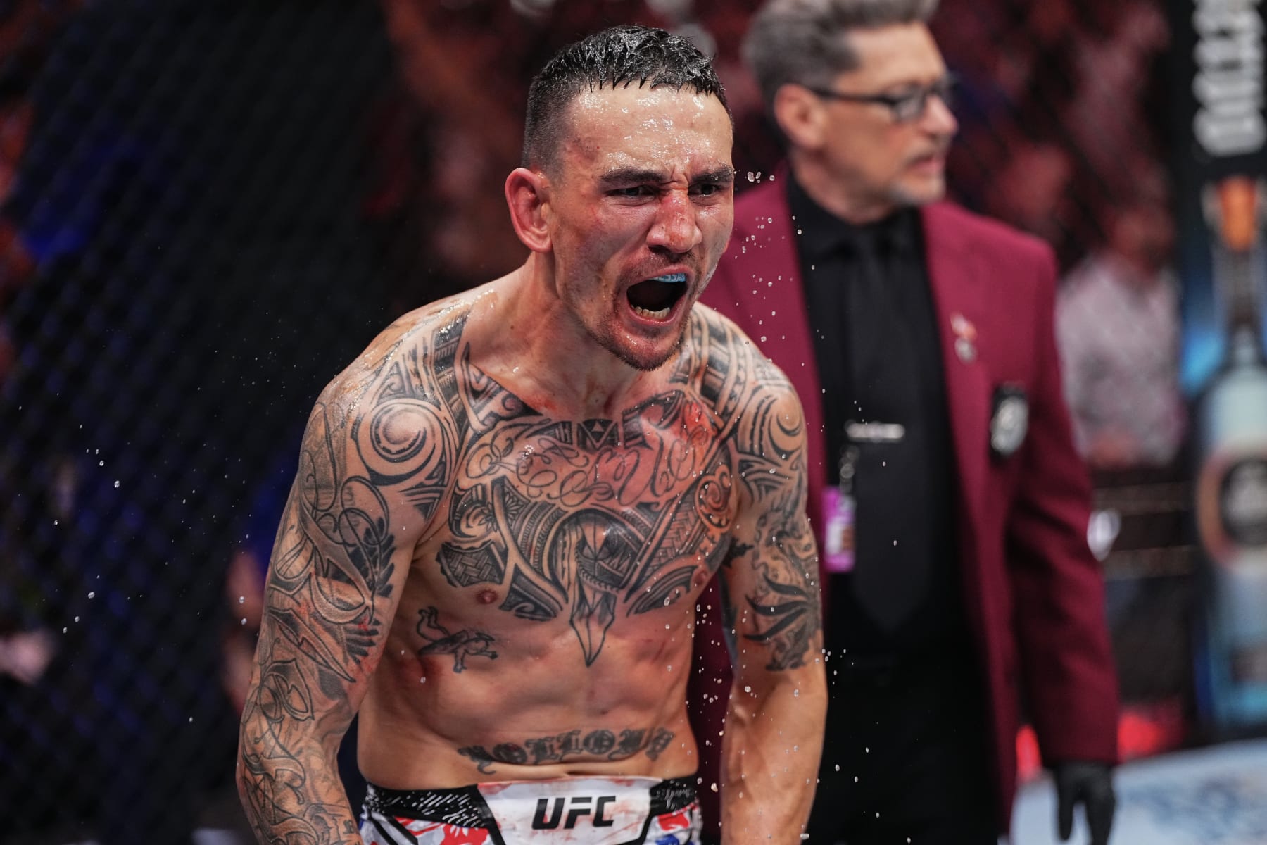 LAS VEGAS, NEVADA - APRIL 13: Max Holloway reacts to the knockout of Justin Gaethje in the BMF championship fight during the UFC 300 event at T-Mobile Arena on April 13, 2024 in Las Vegas, Nevada. (Photo by Jeff Bottari/Zuffa LLC via Getty Images) LAS VEGAS, NEVADA - APRIL 13: Max Holloway reacts to the knockout of Justin Gaethje in the BMF championship fight during the UFC 300 event at T-Mobile Arena on April 13, 2024 in Las Vegas, Nevada. (Photo by Jeff Bottari/Zuffa LLC via Getty Images)