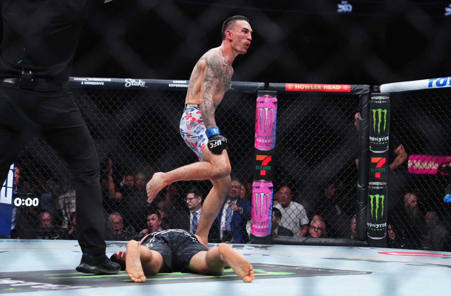 LAS VEGAS, NEVADA - APRIL 13: Max Holloway reacts to his knockout of Justin Gaethje in the BMF championship fight during the UFC 300 event at T-Mobile Arena on April 13, 2024 in Las Vegas, Nevada.  (Photo by Chris Unger/Zuffa LLC via Getty Images)