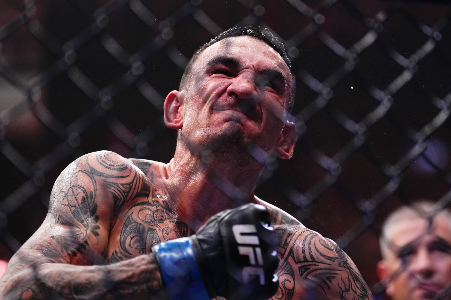 LAS VEGAS, NEVADA - APRIL 13: Max Holloway reacts to his knockout of Justin Gaethje in the BMF championship fight during the UFC 300 event at T-Mobile Arena on April 13, 2024 in Las Vegas, Nevada.  (Photo by Chris Unger/Zuffa LLC via Getty Images)