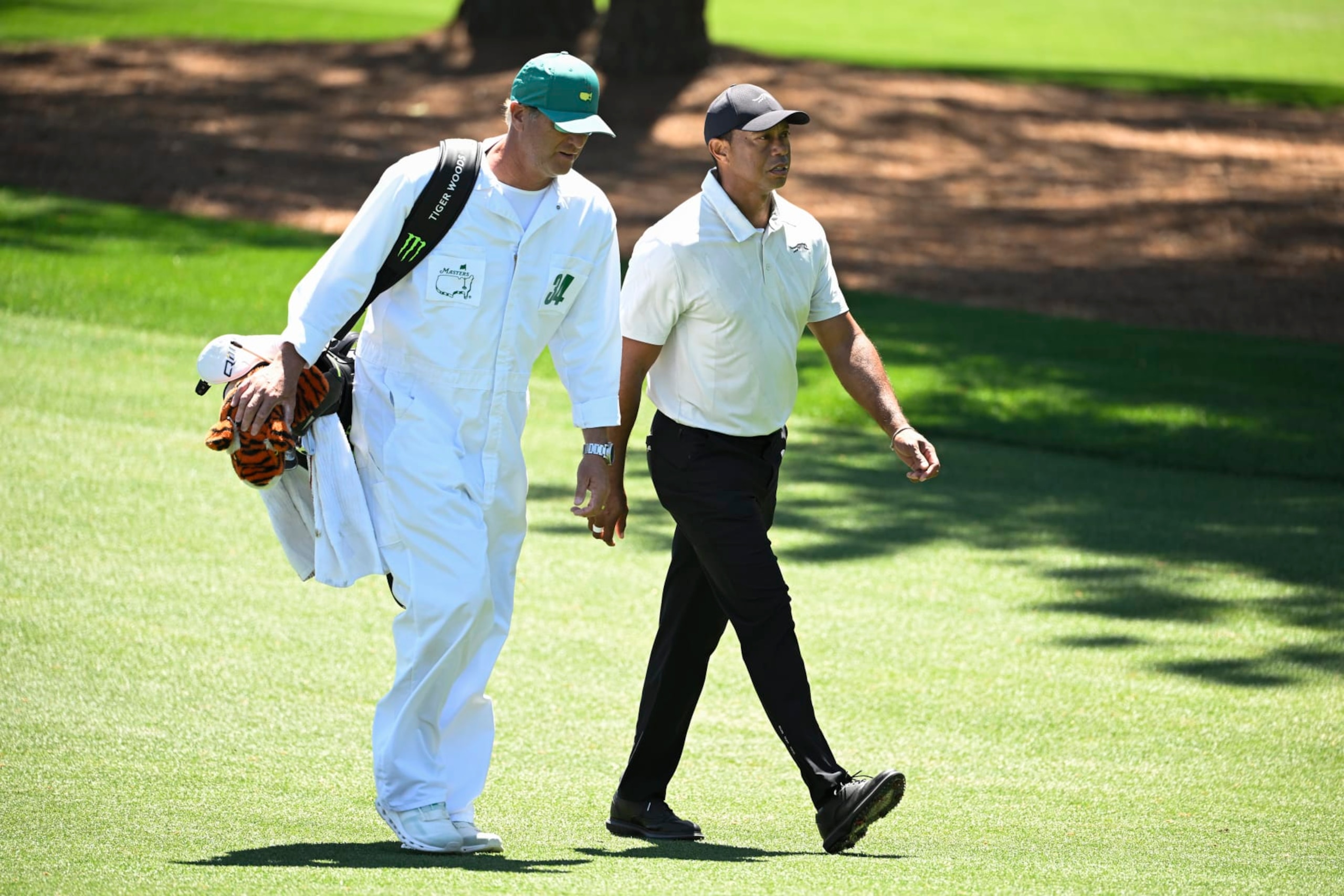 AUGUSTA, GEORGIA - APRIL 13: Tiger Woods with his caddie, Lance Bennett, on the third hole during the third round of Masters Tournament at Augusta National Golf Club on April 13, 2024 in Augusta, Georgia. (Photo by Ben Jared/PGA TOUR via Getty Images) AUGUSTA, GEORGIA - APRIL 13: Tiger Woods with his caddie, Lance Bennett, on the third hole during the third round of Masters Tournament at Augusta National Golf Club on April 13, 2024 in Augusta, Georgia. (Photo by Ben Jared/PGA TOUR via Getty Images)