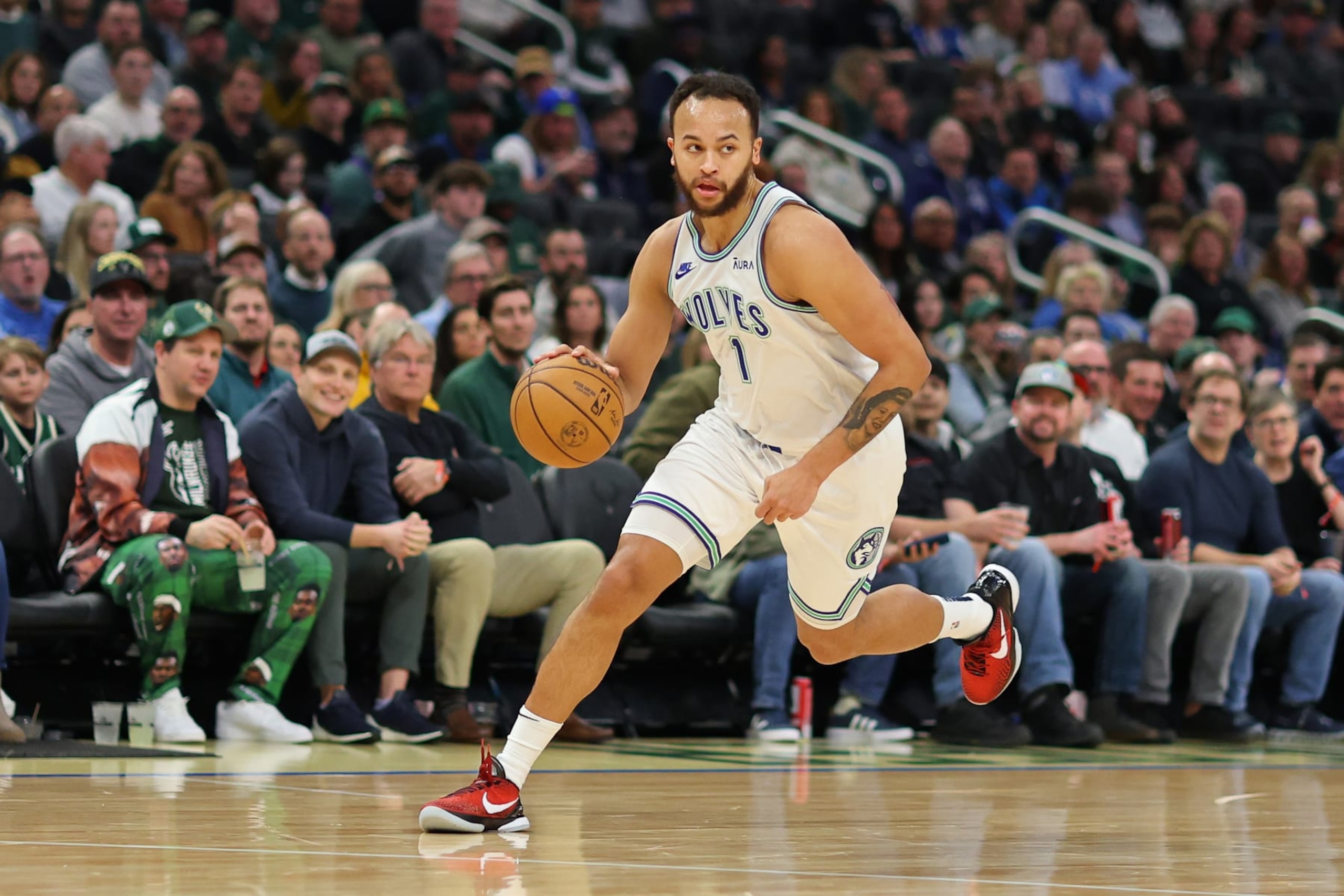 MILWAUKEE, WISCONSIN - FEBRUARY 08: Kyle Anderson #1 of the Minnesota Timberwolves handles the ball during a game against the Milwaukee Bucks at Fiserv Forum on February 08, 2024 in Milwaukee, Wisconsin. NOTE TO USER: User expressly acknowledges and agrees that, by downloading and or using this photograph, User is consenting to the terms and conditions of the Getty Images License Agreement. (Photo by Stacy Revere/Getty Images)