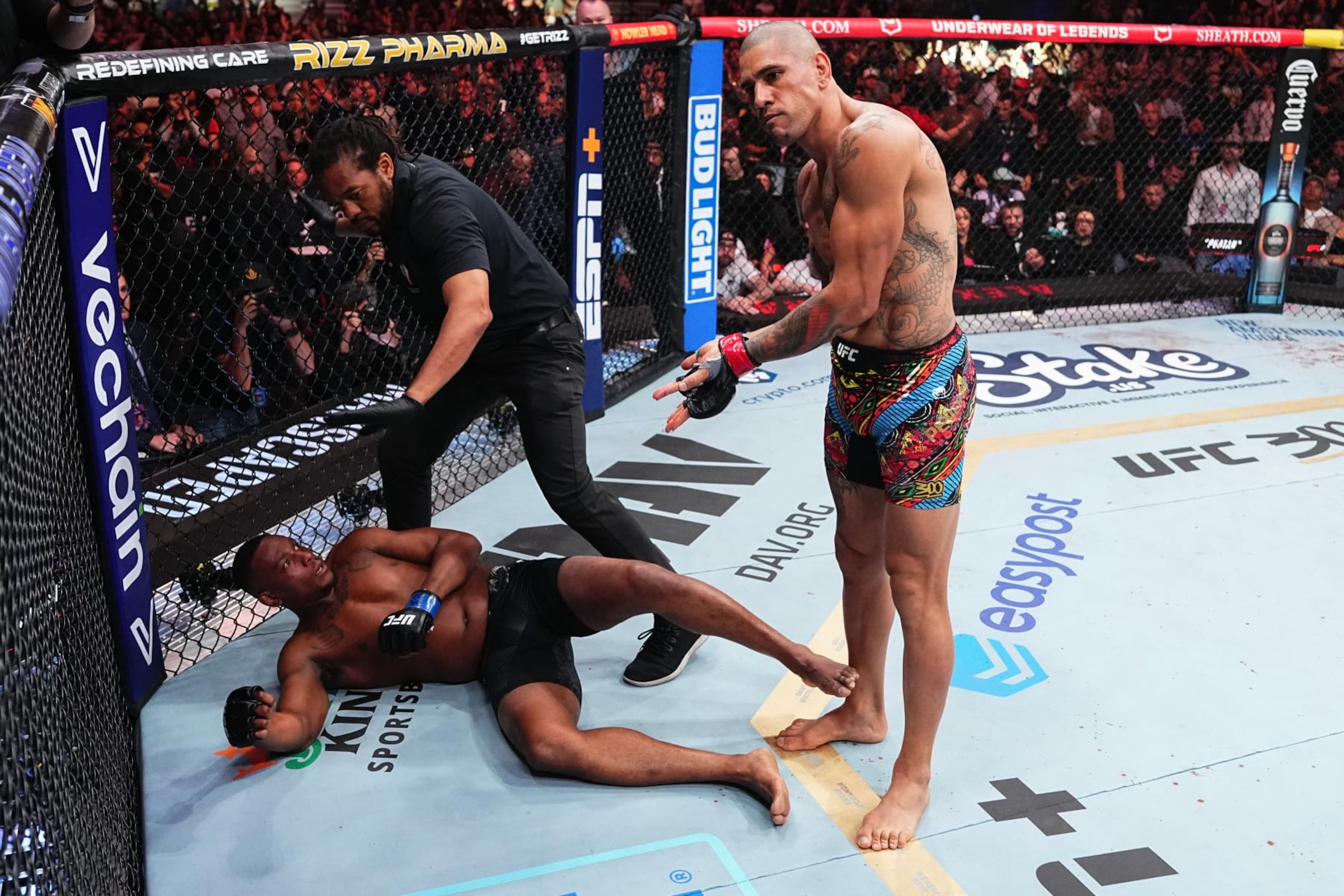 Alex Pereira reacts to his knockout of Jamahal Hill