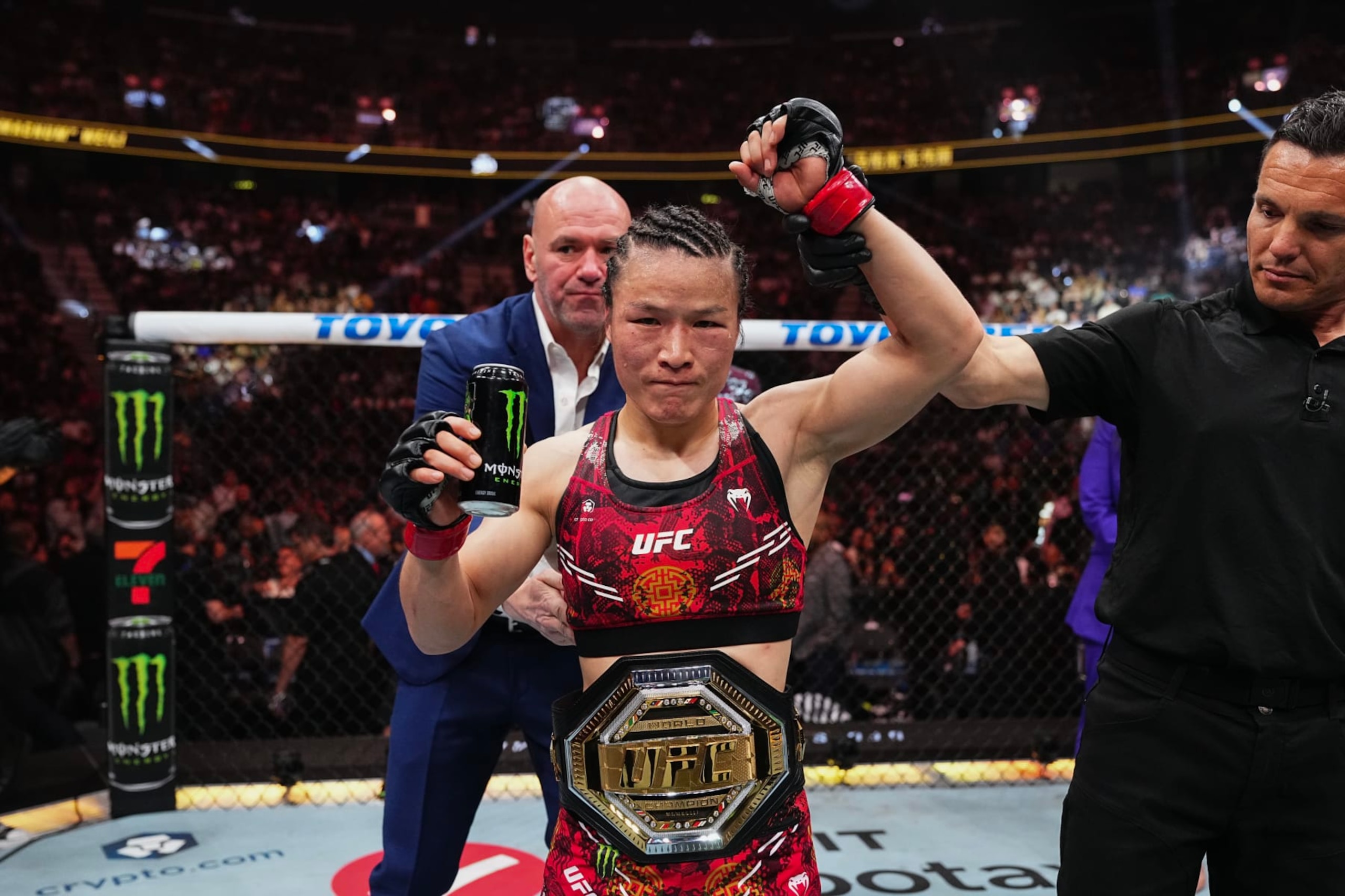 Zhang Weili reacts after successfully defending her strawweight title at UFC 300. 