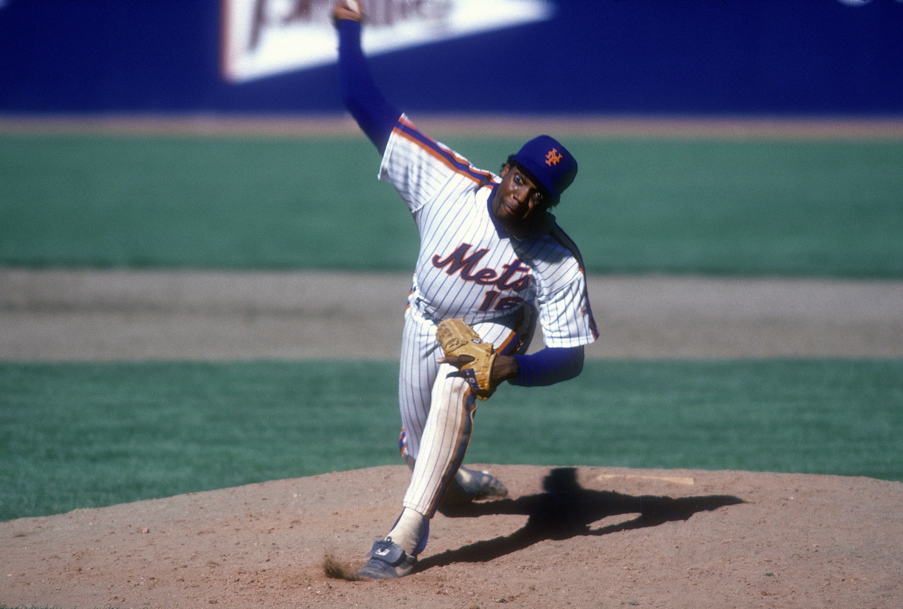 NEW YORK - CIRCA 1987: Dwight Gooden #16 of the New York Mets pitches during a Major League Baseball game circa 1987 at Shea Stadium in the Queens borough of New York City. Gooden played for the Mets from 1984-94. (Photo by Focus on Sport/Getty Images)