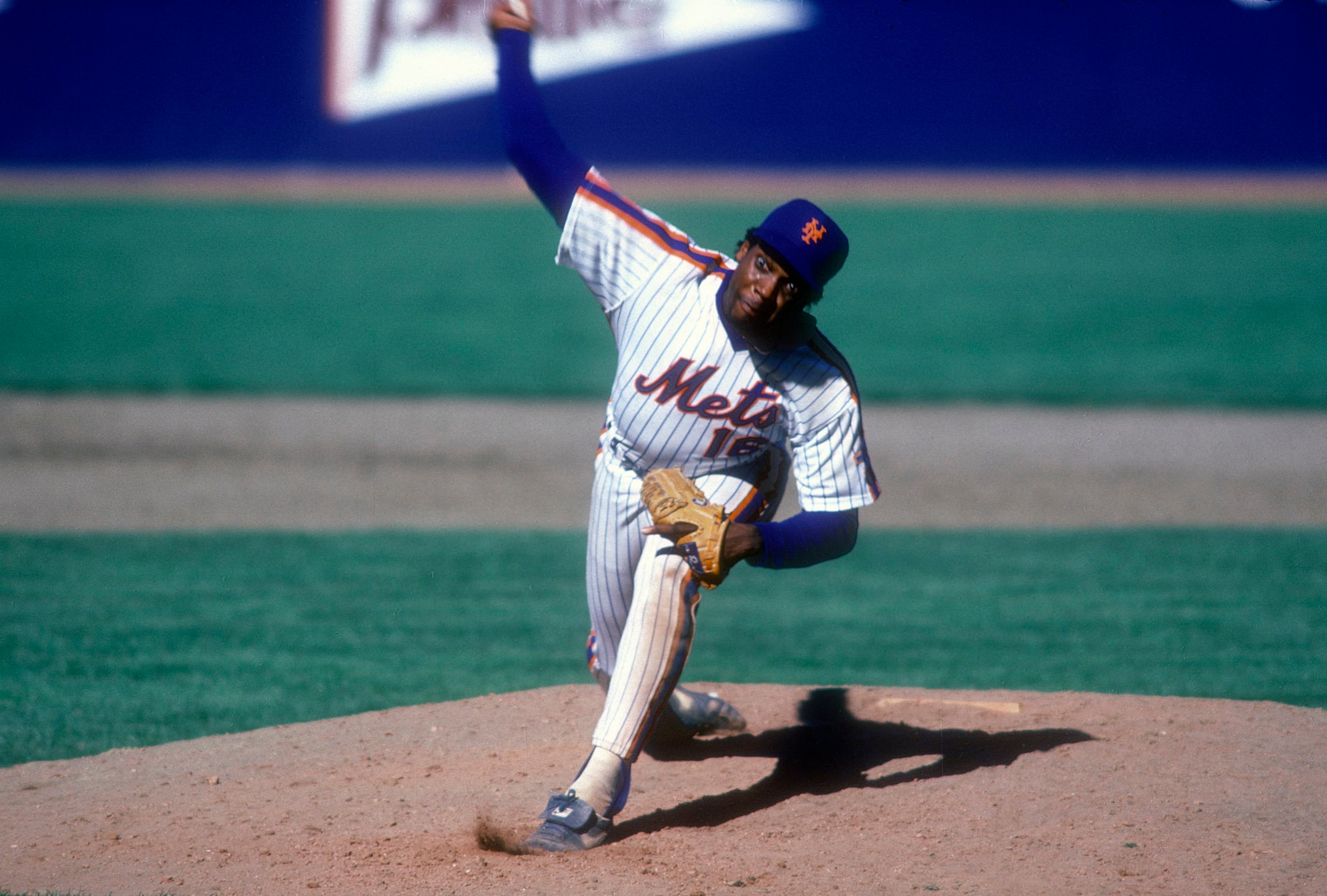 NEW YORK - CIRCA 1987: Dwight Gooden #16 of the New York Mets pitches during a Major League Baseball game circa 1987 at Shea Stadium in the Queens borough of New York City. Gooden played for the Mets from 1984-94. (Photo by Focus on Sport/Getty Images)