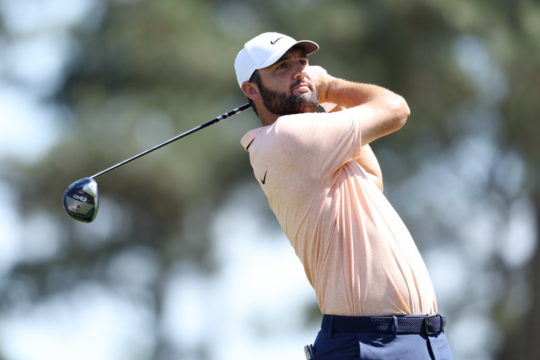 AUGUSTA, GEORGIA - APRIL 14: Scottie Scheffler of the United States plays his shot from the third tee during the final round of the 2024 Masters Tournament at Augusta National Golf Club on April 14, 2024 in Augusta, Georgia. (Photo by Warren Little/Getty Images)