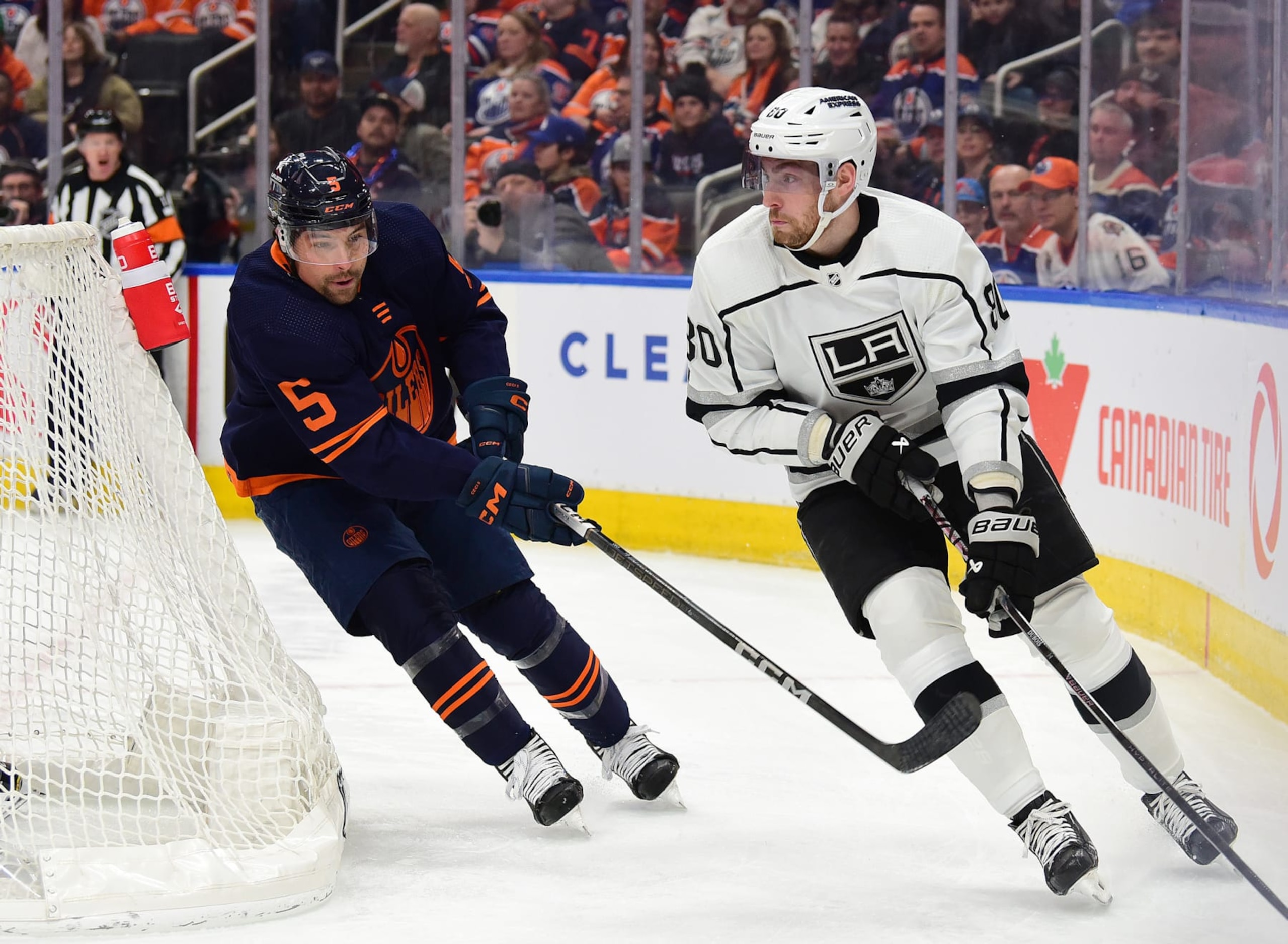 EDMONTON, CANADA - MARCH 28: Pierre-Luc Dubois #80 of the Los Angeles Kings skates against Cody Ceci #5 of the Edmonton Oilers during the game at Rogers Place on March 28, 2024, in Edmonton, Alberta, Canada. (Photo by Leila Devlin/Getty Images)