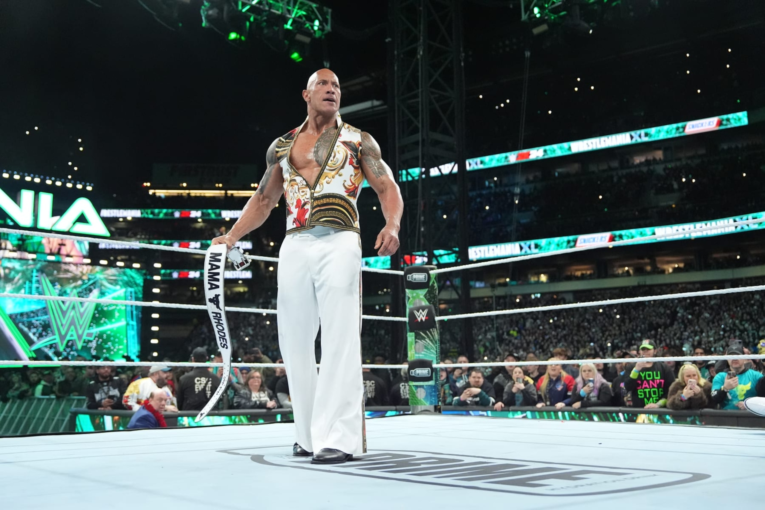 PHILADELPHIA, PENNSYLVANIA - APRIL 7: The Rock and The Undertaker fight on Night Two of WrestleMania 40 at Lincoln Financial Field on April 7, 2024 in Philadelphia, Pennsylvania. (Photo by WWE/Getty Images)