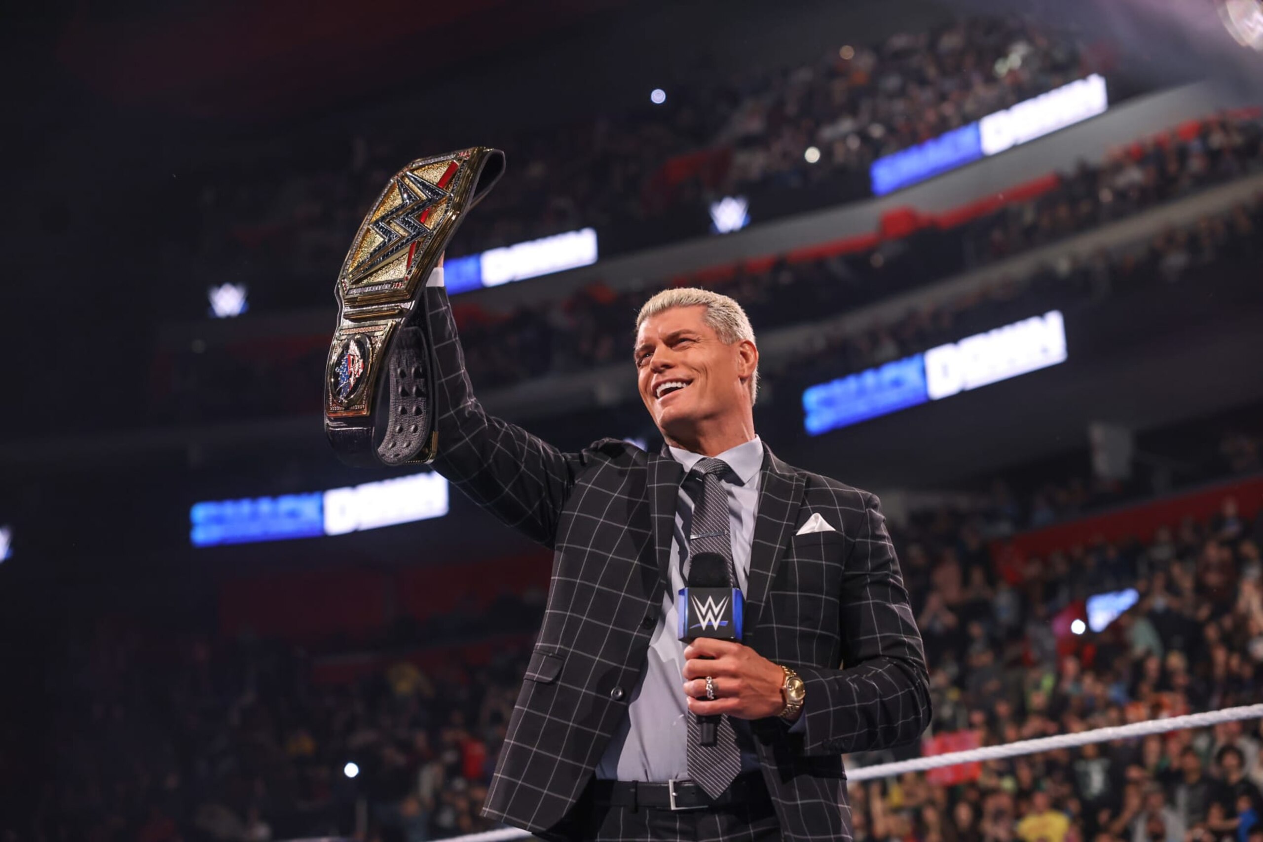 DETROIT, MICHIGAN - APRIL 12: Undisputed WWE Universal Champion Cody Rhodes speaks during Friday Night SmackDown at Little Caesars Arena on April 12, 2024 in Detroit, Michigan. (Photo by WWE/Getty Images)