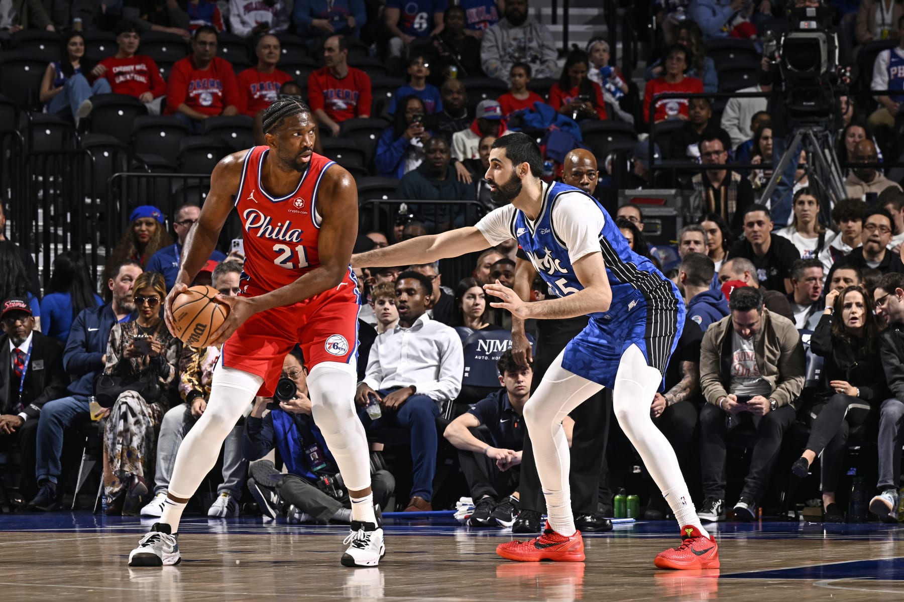 PHILADELPHIA, PA - APRIL 12: Joel Embiid #21 of the Philadelphia 76ers looks to pass the ball during the game against the Orlando Magic on April 12, 2024 at the Wells Fargo Center in Philadelphia, Pennsylvania NOTE TO USER: User expressly acknowledges and agrees that, by downloading and/or using this Photograph, user is consenting to the terms and conditions of the Getty Images License Agreement. Mandatory Copyright Notice: Copyright 2024 NBAE (Photo by David Dow/NBAE via Getty Images)