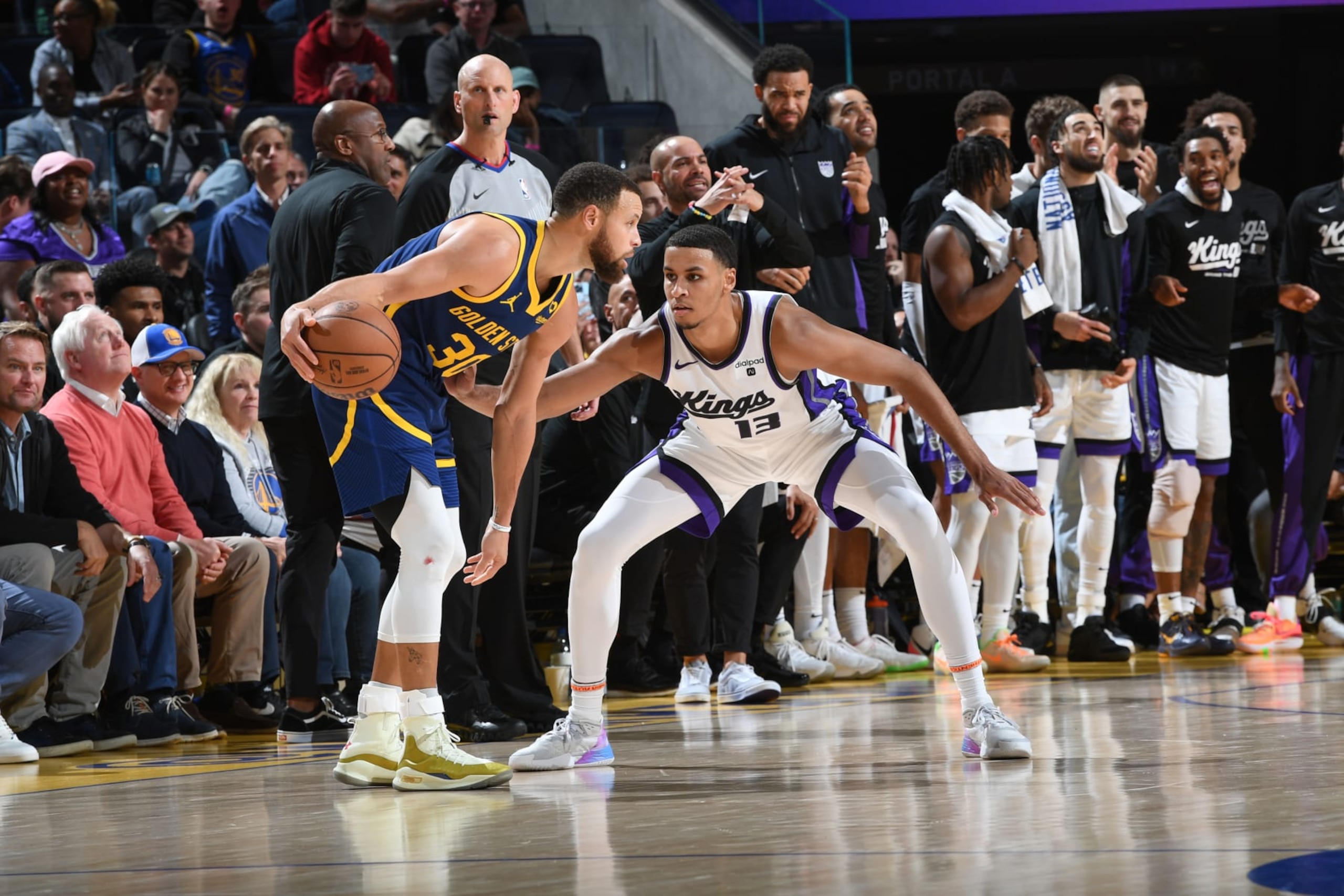 SAN FRANCISCO, CA - JANUARY 25:  Keegan Murray #13 of the Sacramento Kings plays defense during the game  against Stephen Curry #30 of the Golden State Warriors on January 25, 2024 at Chase Center in San Francisco, California. NOTE TO USER: User expressly acknowledges and agrees that, by downloading and or using this photograph, user is consenting to the terms and conditions of Getty Images License Agreement. Mandatory Copyright Notice: Copyright 2024 NBAE (Photo by Noah Graham/NBAE via Getty Images)