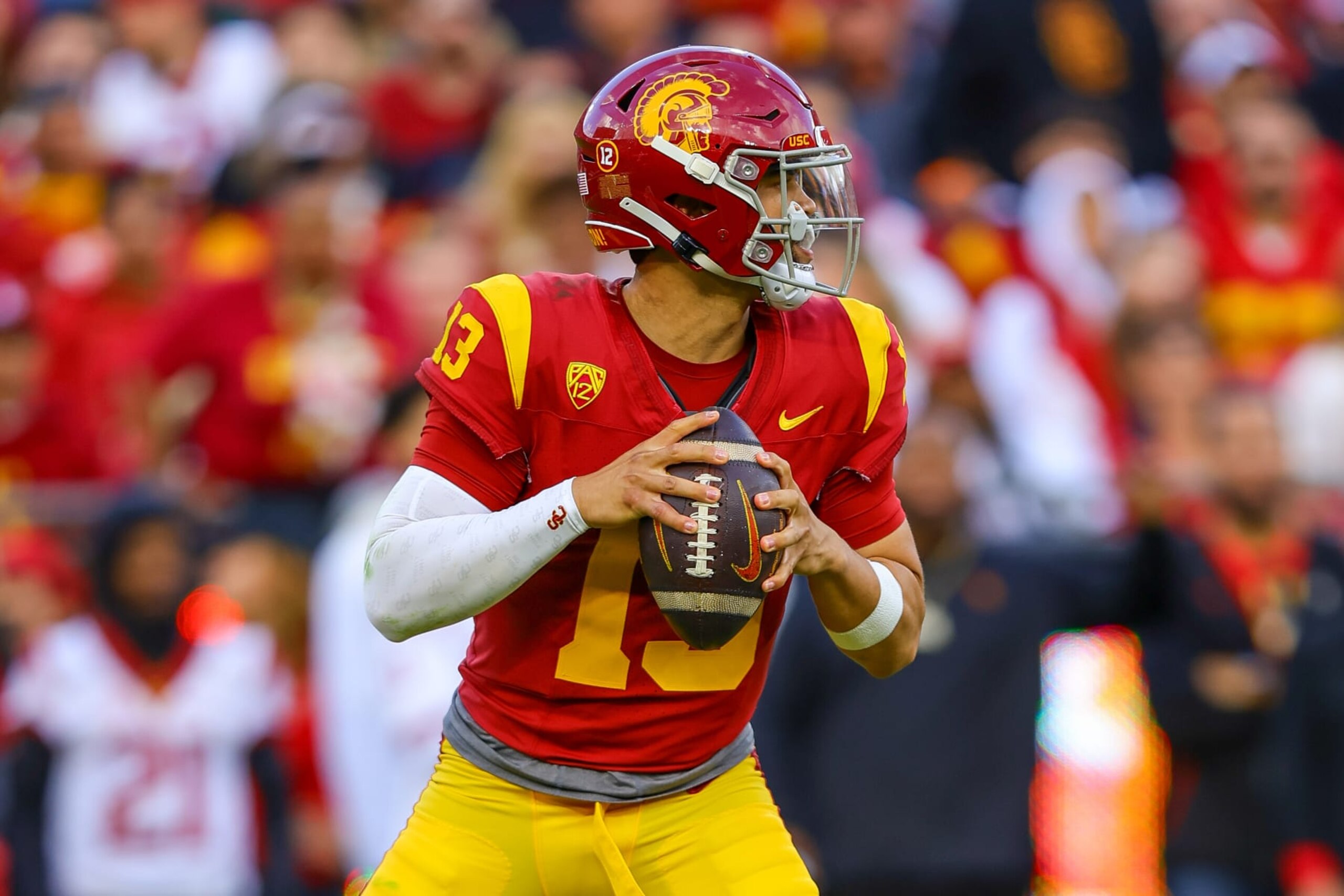 LOS ANGELES, CA - NOVEMBER 18: USC Trojans quarterback Caleb Williams (13) looks to throw the ball during a college football game between the UCLA Bruins and the USC Trojans on November 18, 2023, at the Los Angeles Memorial Coliseum in Los Angeles, CA. (Photo by Jordon Kelly/Icon Sportswire via Getty Images)