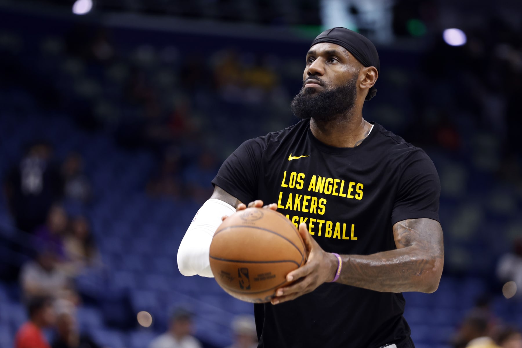 NEW ORLEANS, LOUISIANA - APRIL 14: LeBron James #23 of the Los Angeles Lakers warms up prior to a game against the New Orleans Pelicans at Smoothie King Center on April 14, 2024 in New Orleans, Louisiana.  NOTE TO USER: User expressly acknowledges and agrees that, by downloading and or using this photograph, User is consenting to the terms and conditions of the Getty Images License Agreement. (Photo by Tyler  Kaufman/Getty Images)
