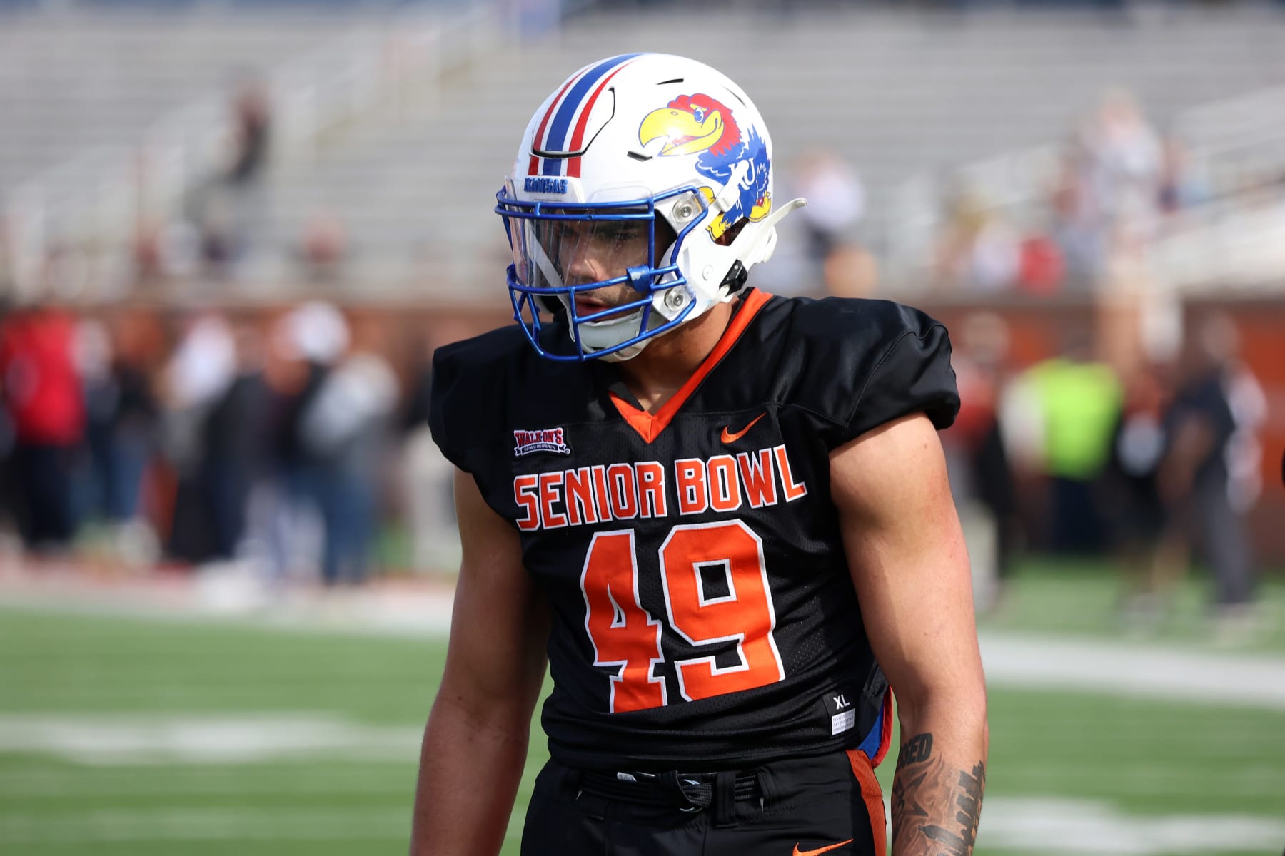 MOBILE, AL - FEBRUARY 01: National edge Austin Booker of Kansas (49)during the National team practice for the Reese's Senior Bowl on February 1, 2024 at Hancock Whitney Stadium in Mobile, Alabama.  (Photo by Michael Wade/Icon Sportswire via Getty Images)