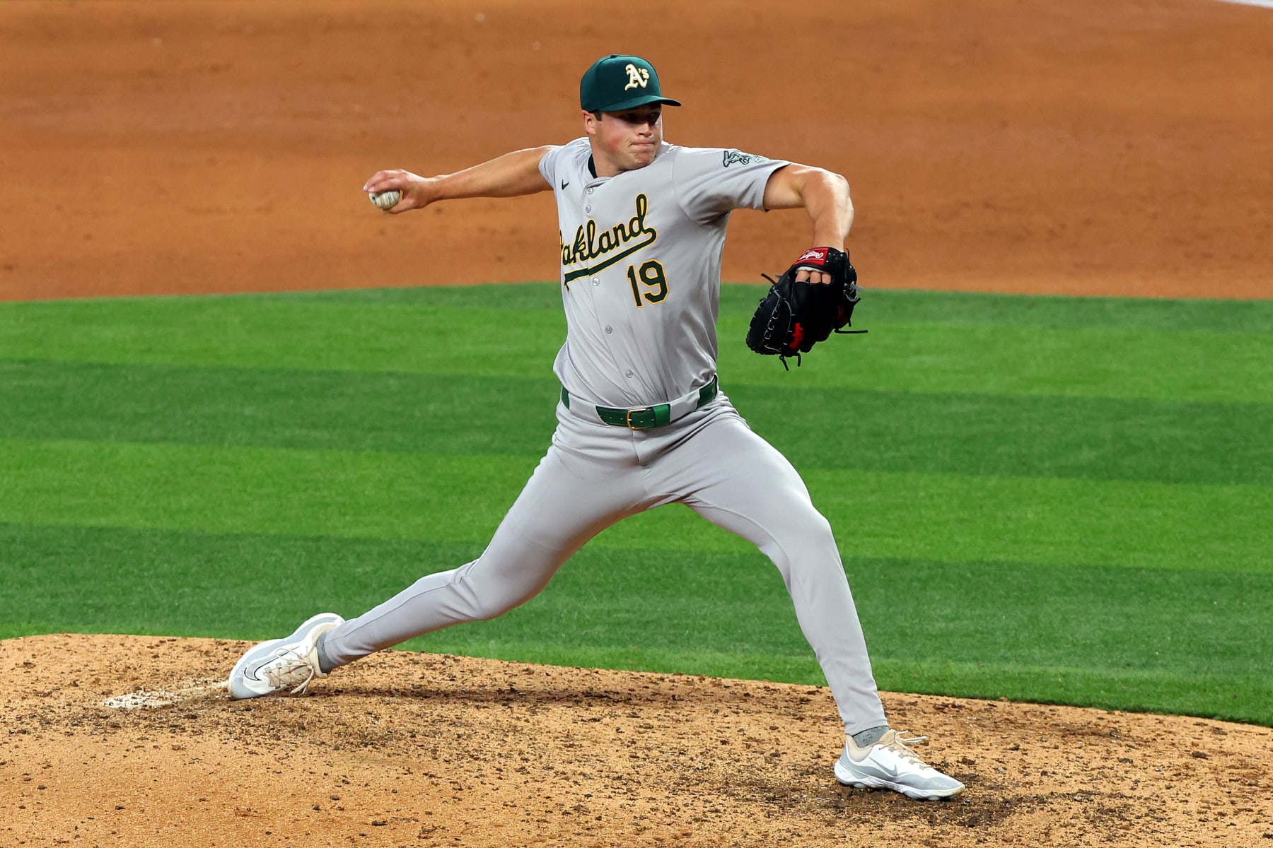 ARLINGTON, TEXAS - APRIL 11: Mason Miller #19 of the Oakland Athletics pitches in the ninth inning against the Texas Rangers at Globe Life Field on April 11, 2024 in Arlington, Texas. (Photo by Richard Rodriguez/Getty Images)
