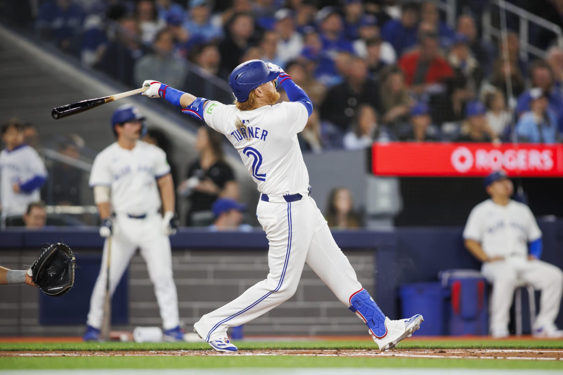 TORONTO, CANADA - APRIL 8: Justin Turner #2 of the Toronto Blue Jays hits a double in the second inning of their MLB Home Opener game against the Seattle Mariners at Rogers Centre on April 8, 2024 in Toronto, Canada. (Photo by Cole Burston/Getty Images)