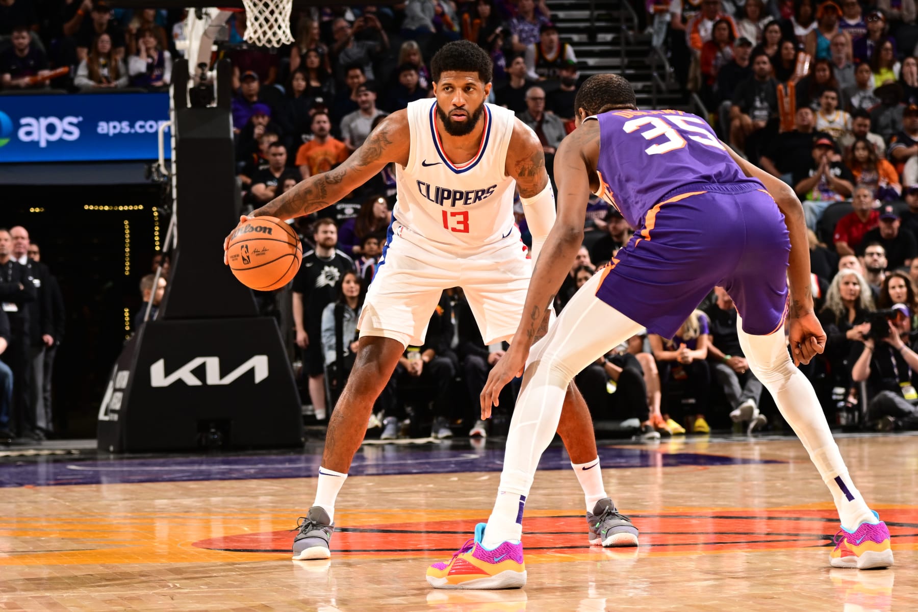 PHOENIX, AZ - APRIL  9:  Paul George #13 of the LA Clippers handles the ball during the game against the Phoenix Suns on April 9, 2024 at Footprint Center in Phoenix, Arizona. NOTE TO USER: User expressly acknowledges and agrees that, by downloading and or using this photograph, user is consenting to the terms and conditions of the Getty Images License Agreement. Mandatory Copyright Notice: Copyright 2024 NBAE (Photo by Kate Frese/NBAE via Getty Images)