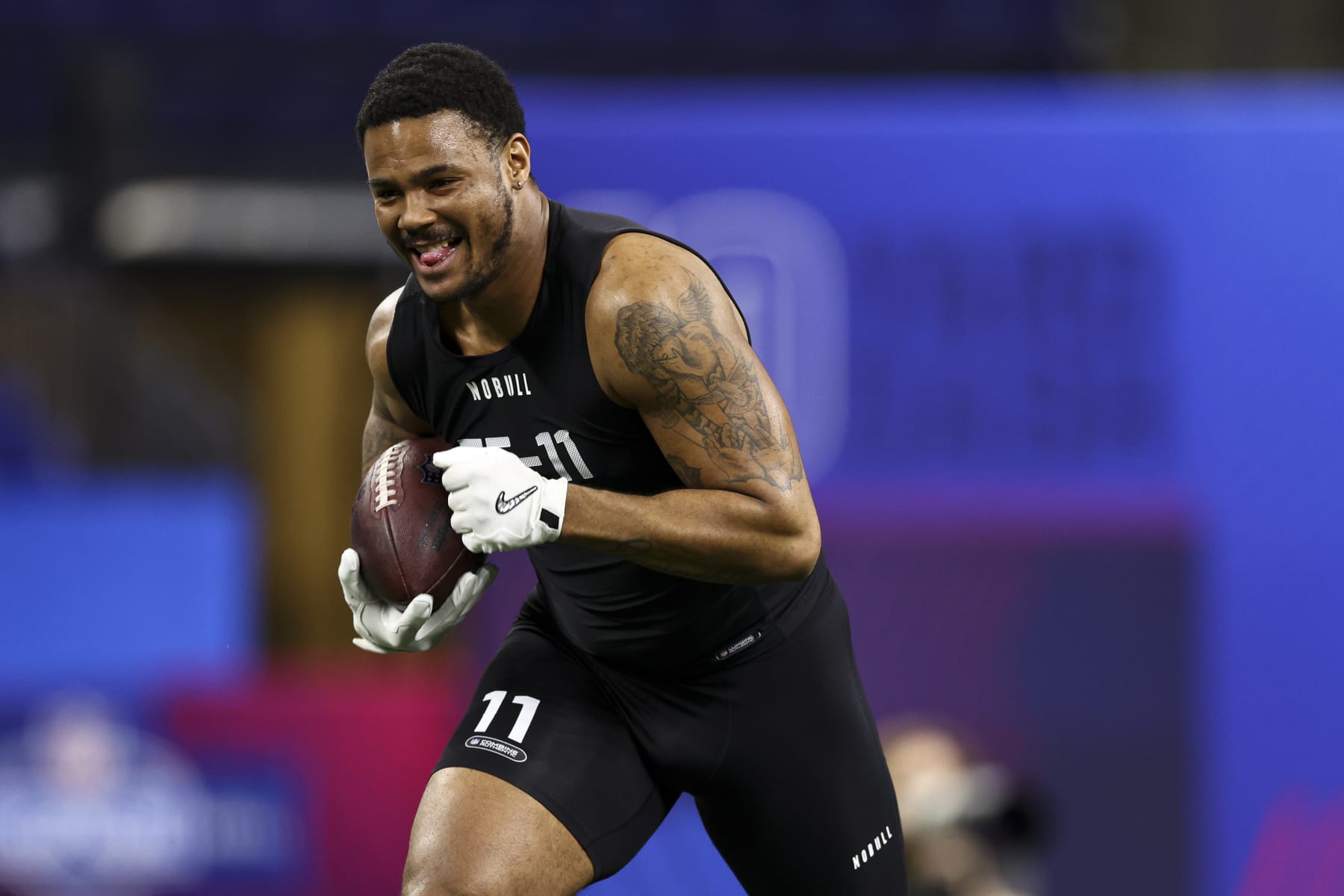 INDIANAPOLIS, INDIANA - MARCH 1: Ja'Tavion Sanders #TE11 of Texas participates in a drill during the NFL Combine at the Lucas Oil Stadium on March 1, 2024 in Indianapolis, Indiana. (Photo by Kevin Sabitus/Getty Images)