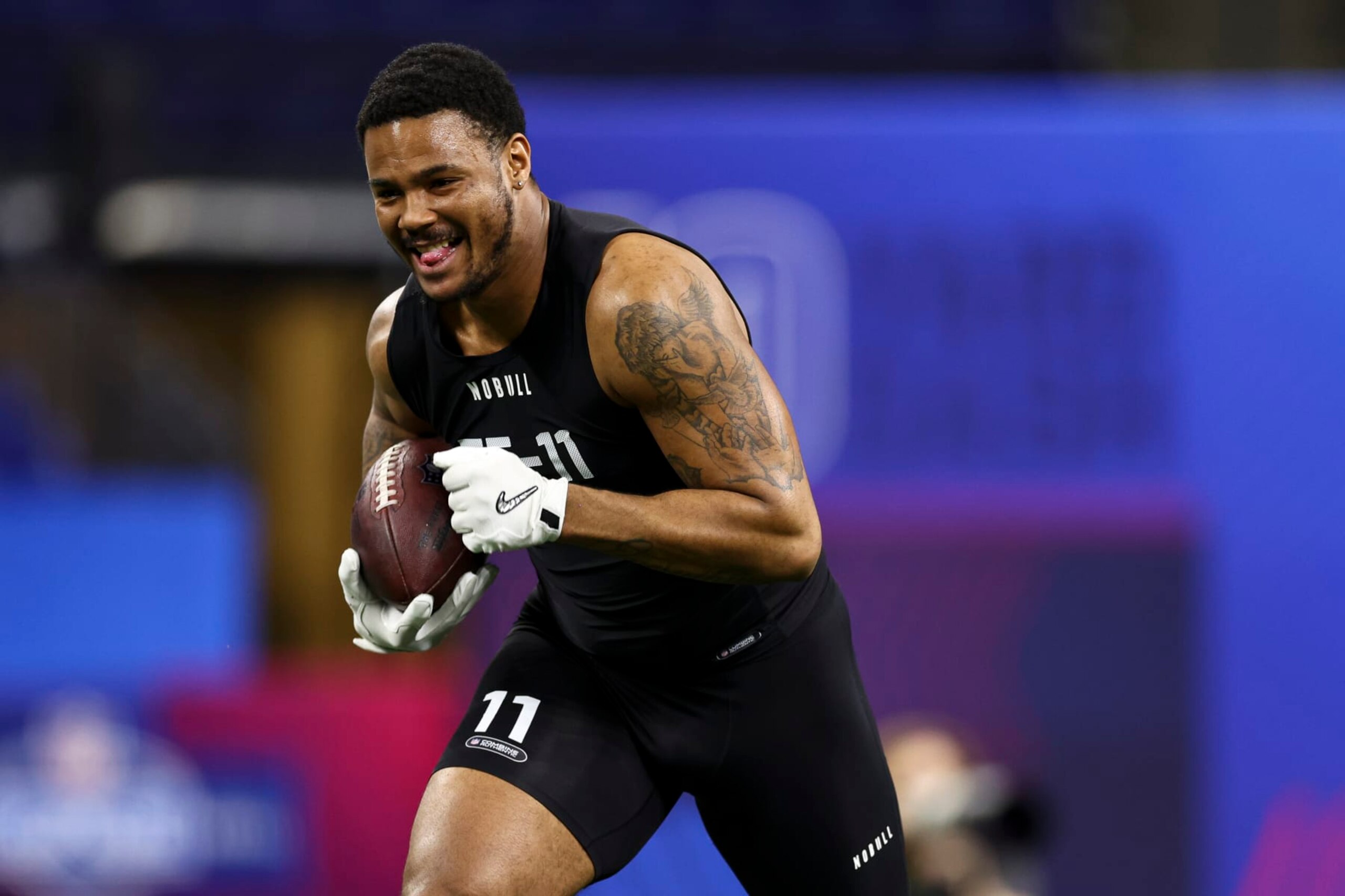 INDIANAPOLIS, INDIANA - MARCH 1: Ja'Tavion Sanders #TE11 of Texas participates in a drill during the NFL Combine at the Lucas Oil Stadium on March 1, 2024 in Indianapolis, Indiana. (Photo by Kevin Sabitus/Getty Images)