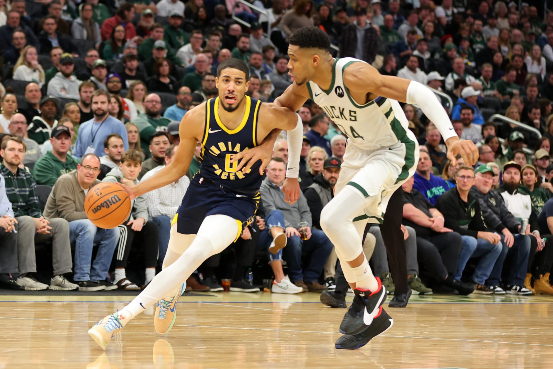 Tyrese Haliburton and Giannis Antetokounmpo