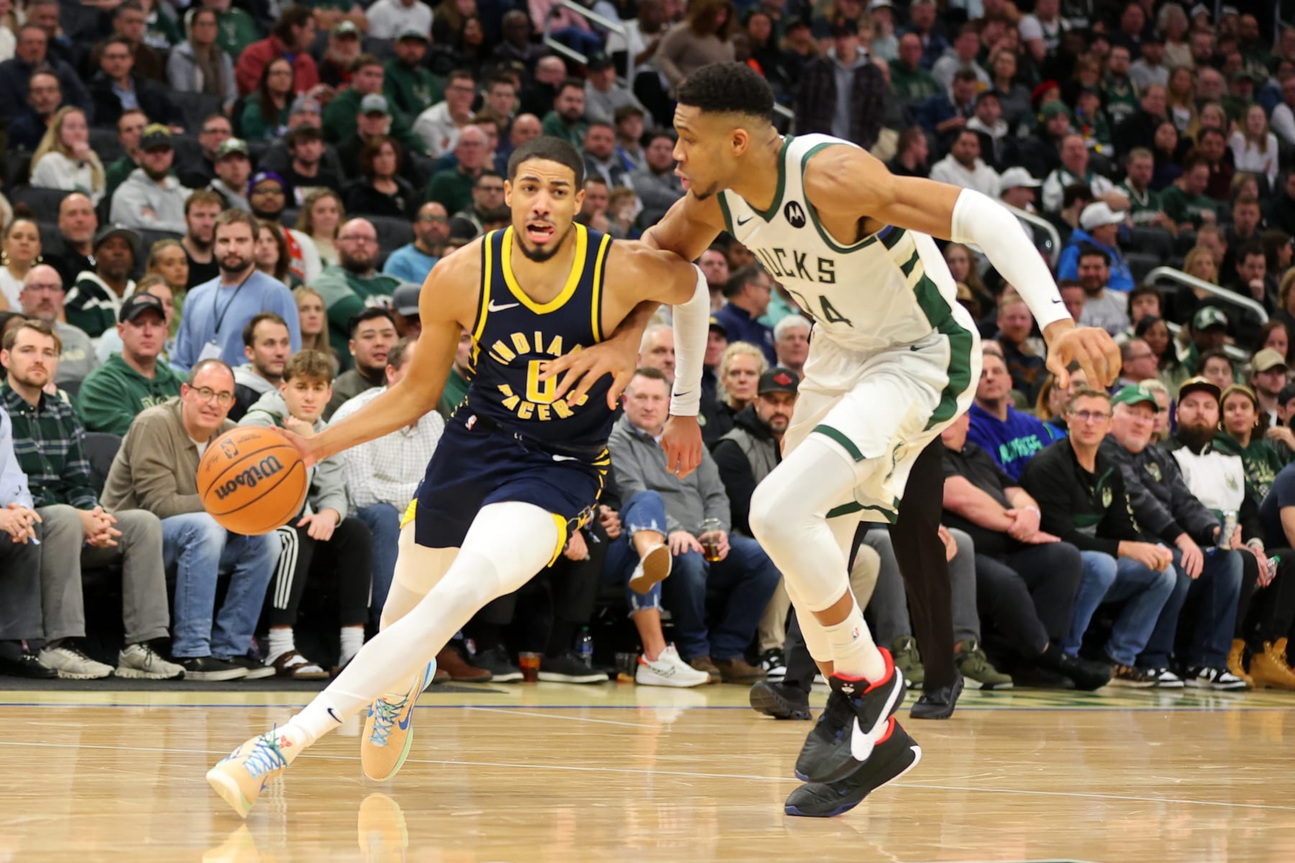 Tyrese Haliburton and Giannis Antetokounmpo