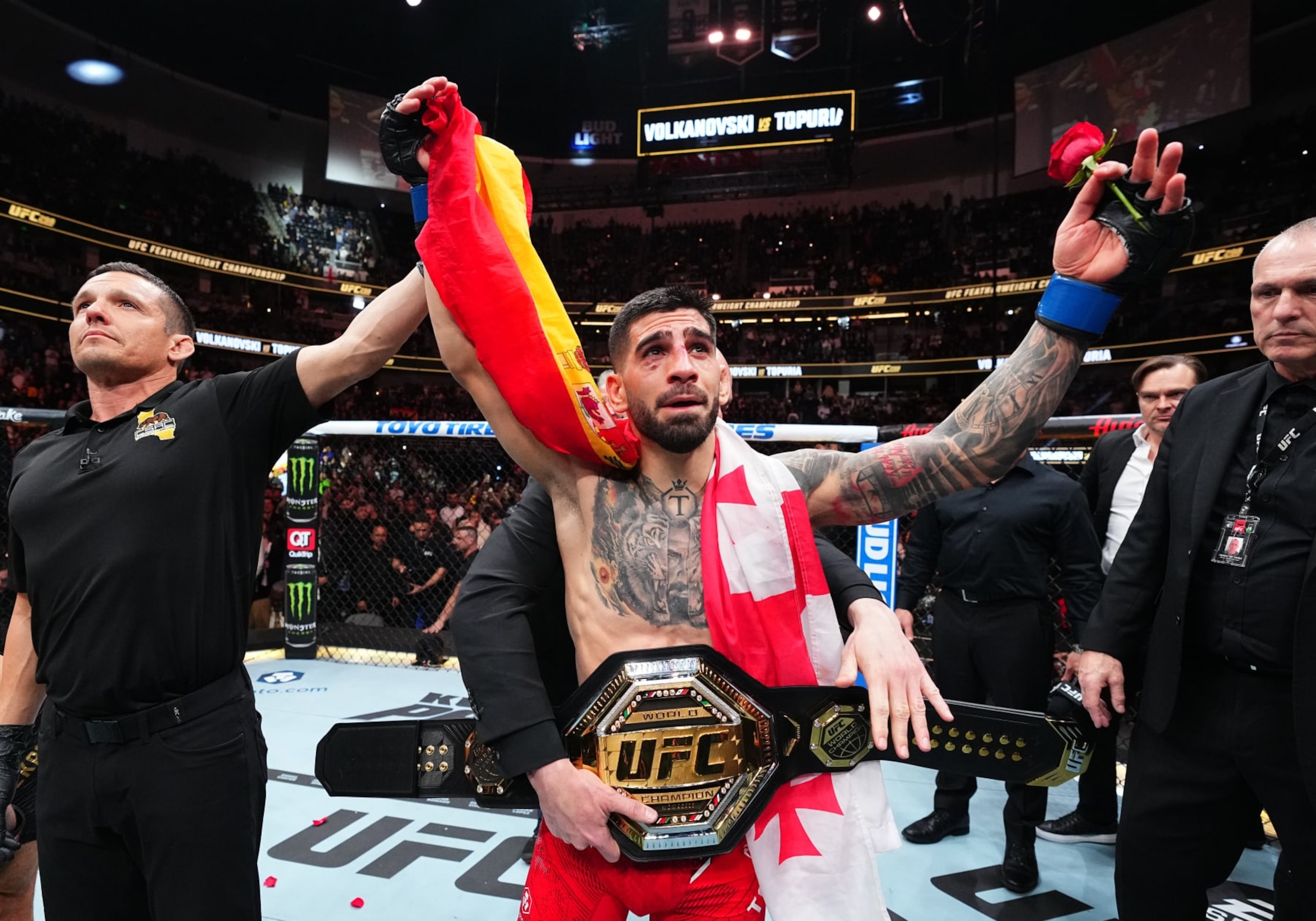 Ilia Topuria celebrates after his knockout victory against Alexander Volkanovski 