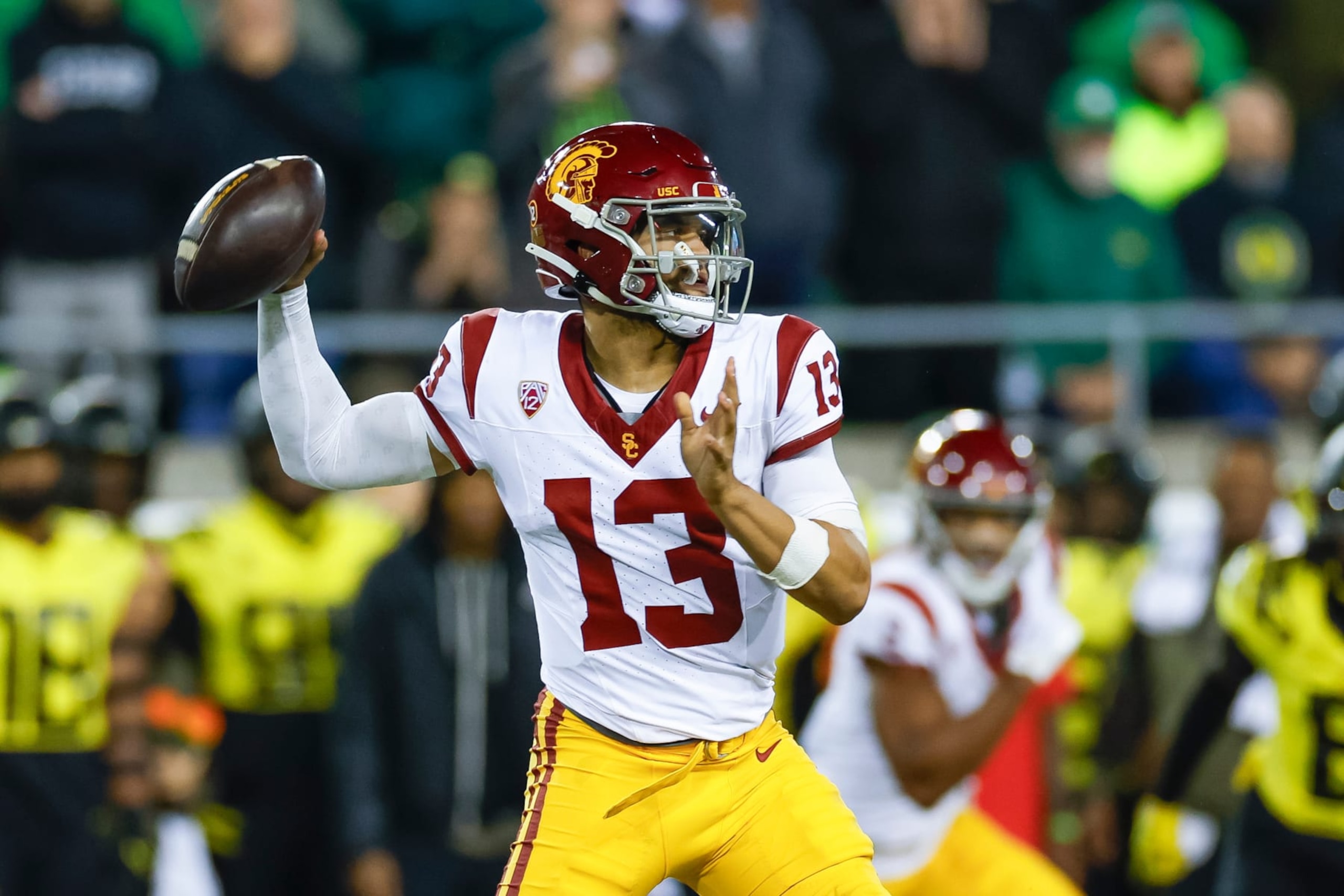 EUGENE, OREGON - NOVEMBER 11: Caleb Williams #13 of the USC Trojans passes the ball in the first half during a game against the Oregon Ducks at Autzen Stadium on November 11, 2023 in Eugene, Oregon. (Photo by Brandon Sloter/Image Of Sport/Getty Images)