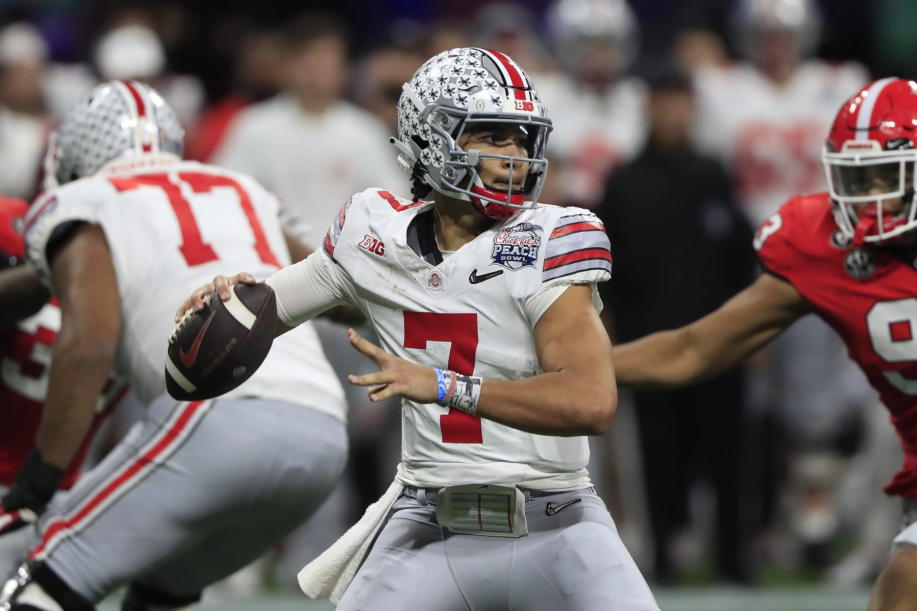 ATLANTA, GA - DECEMBER 31: Ohio State Buckeyes quarterback C.J. Stroud (7) drops back to pass during the college football playoff semifinal game between the University of Georgia Bulldogs and The Ohio State Buckeyes on December 31, 2022 at the Mercedes-Benz Stadium in Atlanta, GA.  (Photo by David J. Griffin/Icon Sportswire via Getty Images)