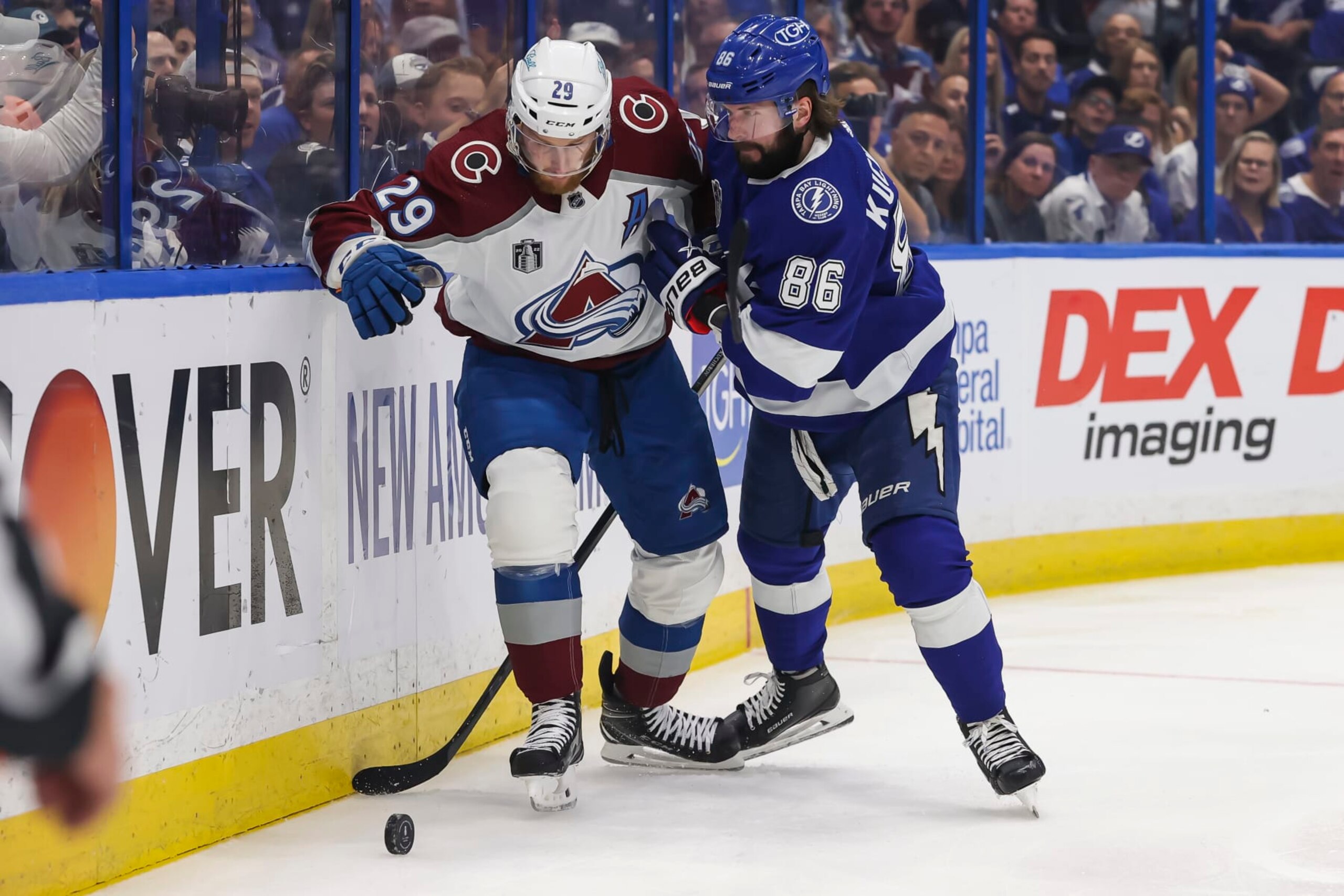 Colorado Avalanche center Nathan MacKinnon (left) and Tampa Bay Lightning winger Nikita Kucherov. 