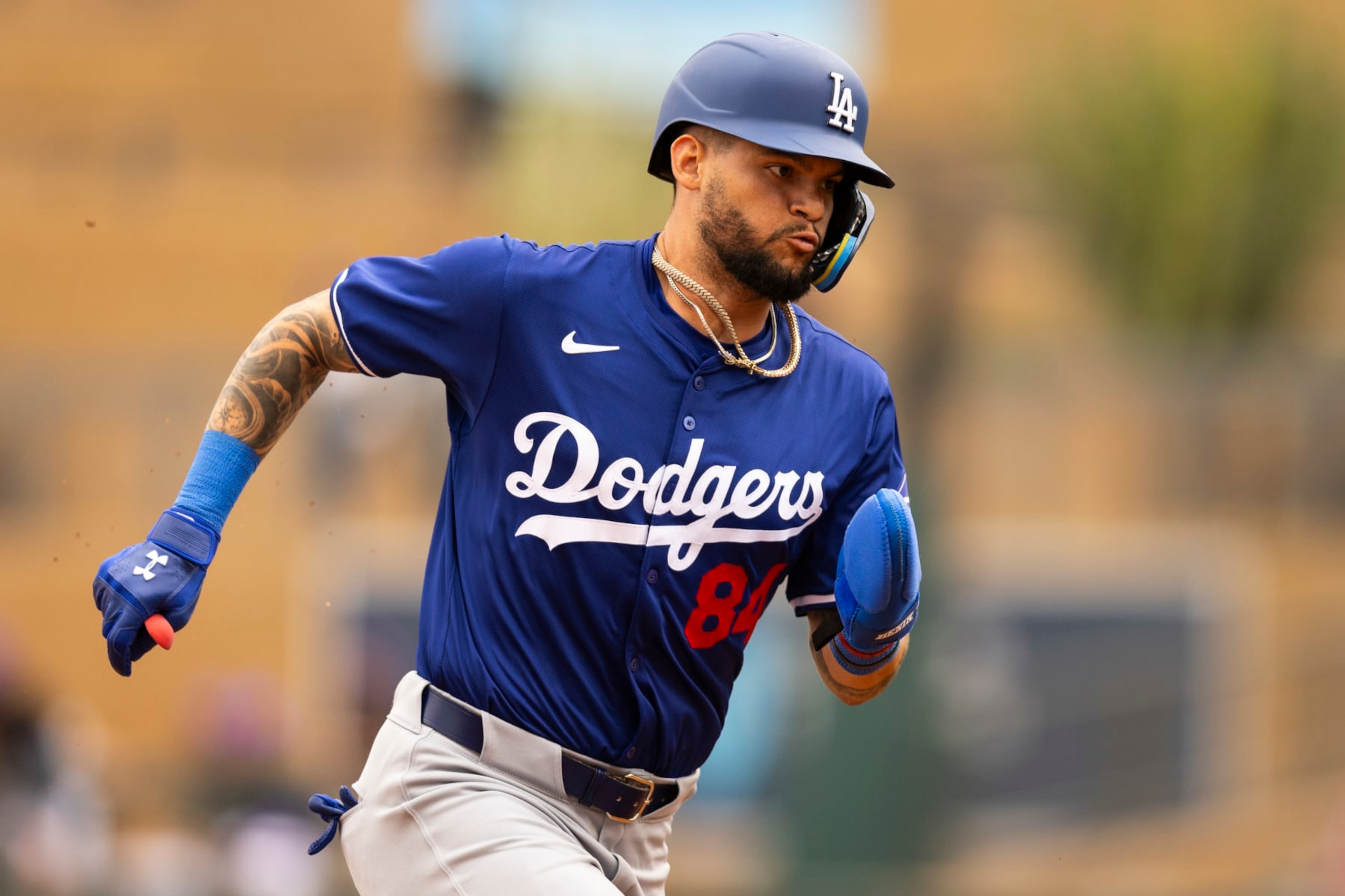 TALKING STICK,  - FEBRUARY 26: Andy Pages #84 of the Los Angeles Dodgers runs to third base during the 2024 Spring Training Game between Los Angeles Dodgers and Colorado Rockies  at Salt River Fields on Monday, February 26, 2024 in Talking Stick, Arizona . (Photo by Adam Glanzman/MLB Photos via Getty Images)