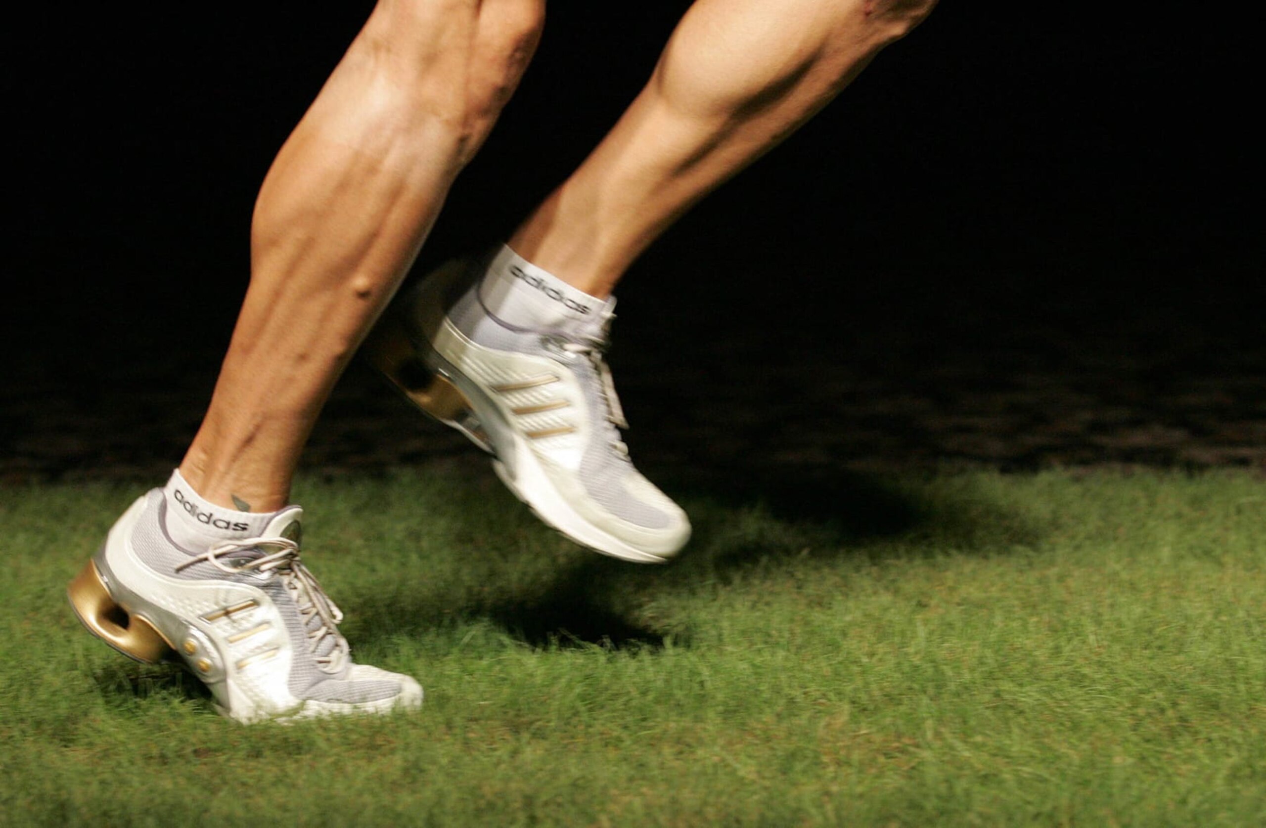 UNSPECIFIED - APRIL 14:  Generic Sport Image. An athlete runs accross grass in a pair of running shoes.  (Photo by Sandra Mu/Getty Images)