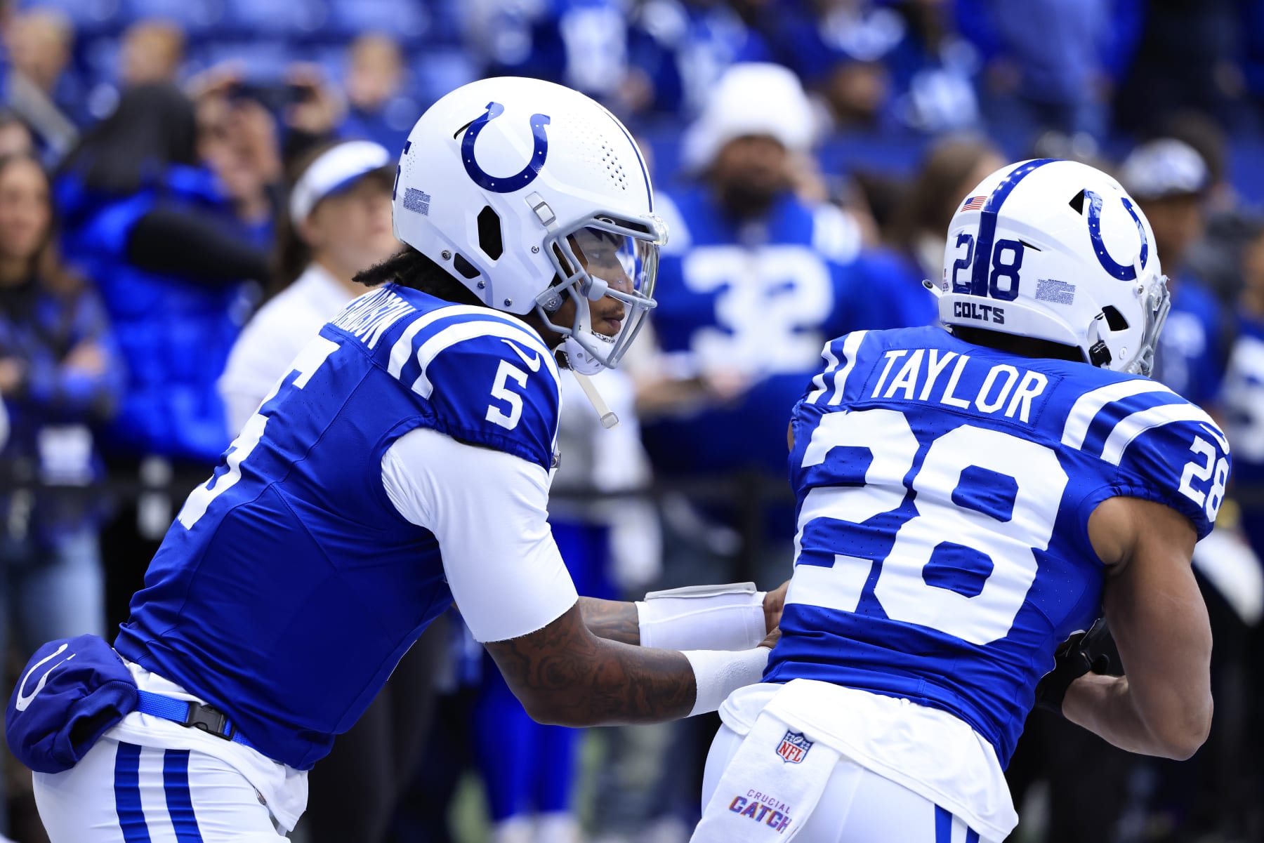 INDIANAPOLIS, INDIANA - OCTOBER 08: Jonathan Taylor #28 and Anthony Richardson #5 of the Indianapolis Colts warm up prior to the game against the Tennessee Titans at Lucas Oil Stadium on October 08, 2023 in Indianapolis, Indiana. (Photo by Justin Casterline/Getty Images)
