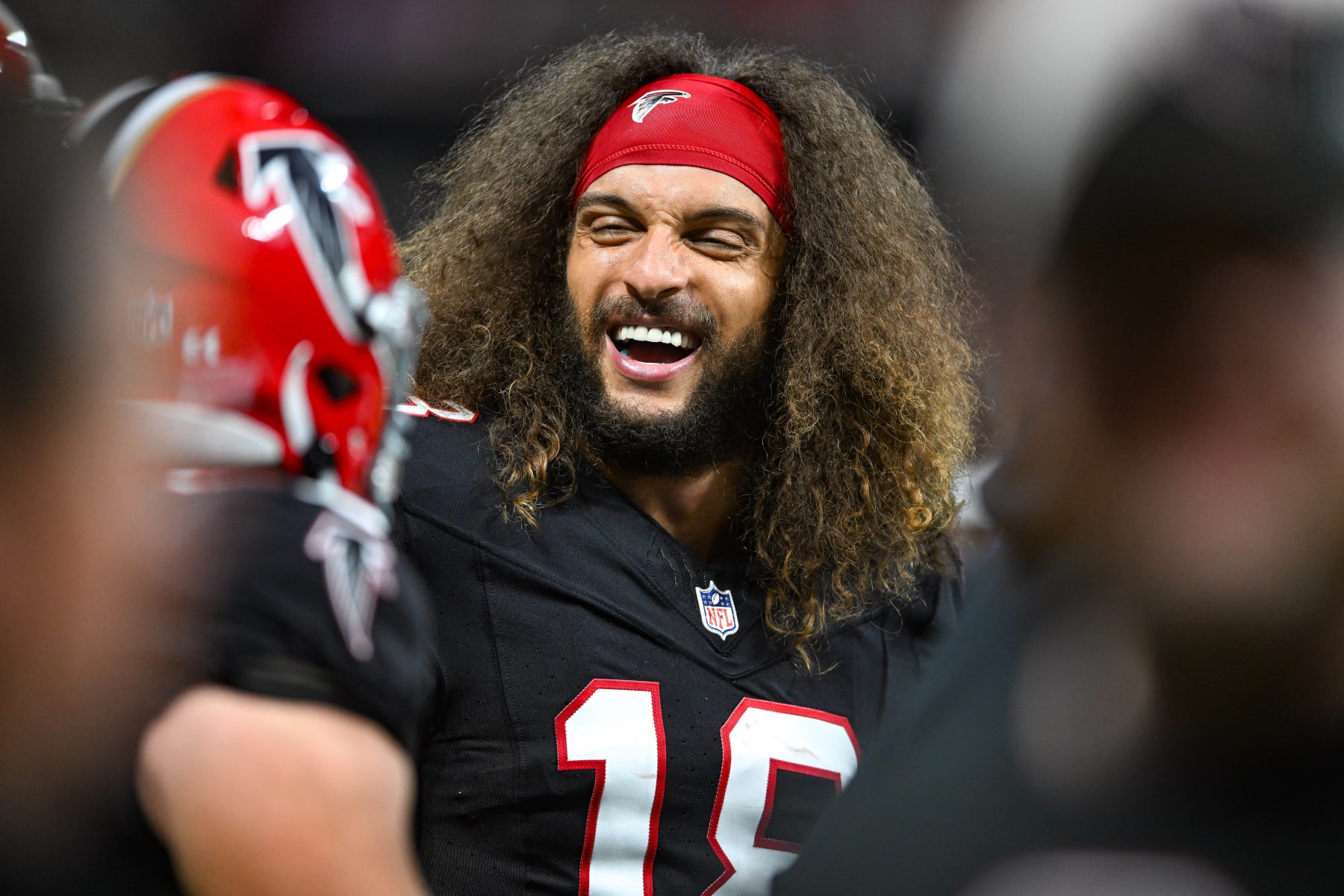 ATLANTA, GA  OCTOBER 15:  Atlanta wide receiver Mack Hollins (18) reacts on the sideline during the NFL game between the Washington Commanders and the Atlanta Falcons on October 15th, 2023 at Mercedes-Benz Stadium in Atlanta, GA.  (Photo by Rich von Biberstein/Icon Sportswire via Getty Images)