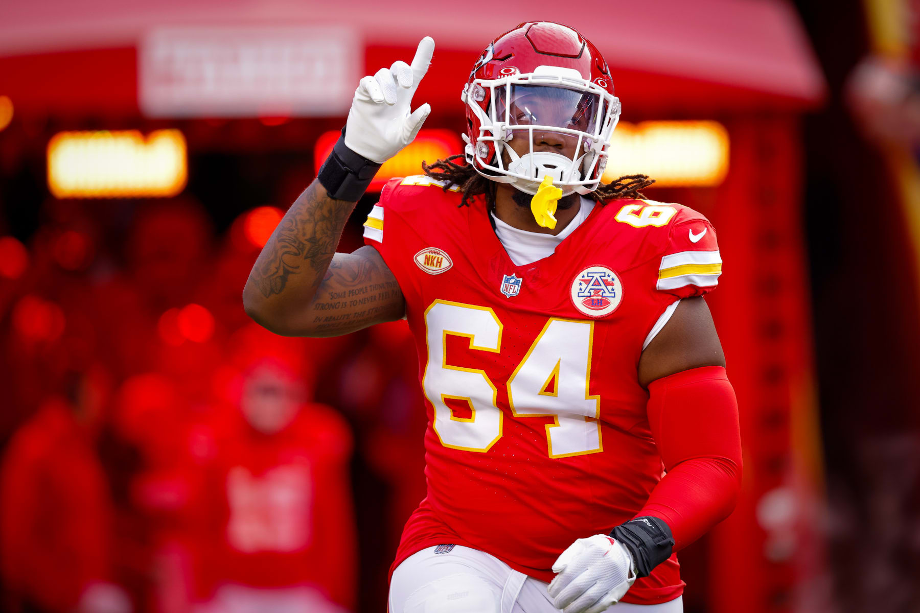 KANSAS CITY, MISSOURI - DECEMBER 10: Wanya Morris #64 of the Kansas City Chiefs runs onto the field during introductions prior to the game against the Buffalo Bills at GEHA Field at Arrowhead Stadium on December 10, 2023 in Kansas City, Missouri. (Photo by David Eulitt/Getty Images)