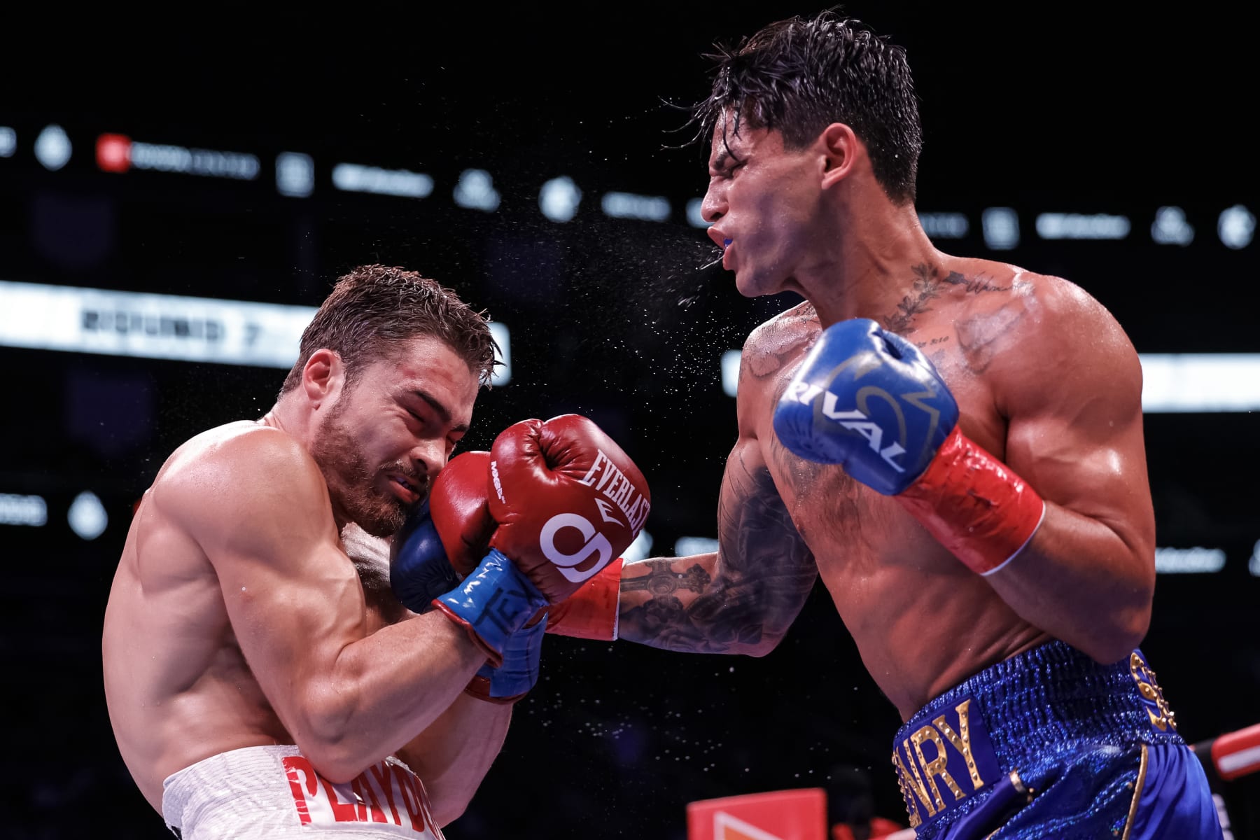 HOUSTON, TEXAS - DECEMBER 02: Ryan Garcia exchanges punches with Oscar Duarte during their welterweight fight at Toyota Center on December 02, 2023 in Houston, Texas. (Photo by Carmen Mandato/Getty Images)