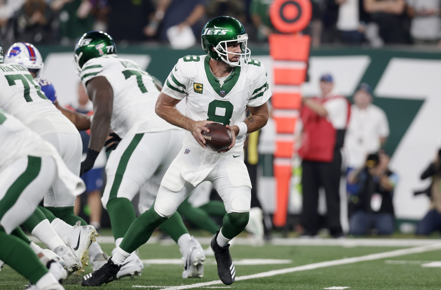 EAST RUTHERFORD, NEW JERSEY - SEPTEMBER 11: (NEW YORK DAILIES OUT)  Aaron Rodgers #8 of the New York Jets in action against the Buffalo Bills at MetLife Stadium on September 11, 2023 in East Rutherford, New Jersey. The Jets defeated the Bills 22-16 in overtime. (Photo by Jim McIsaac/Getty Images)