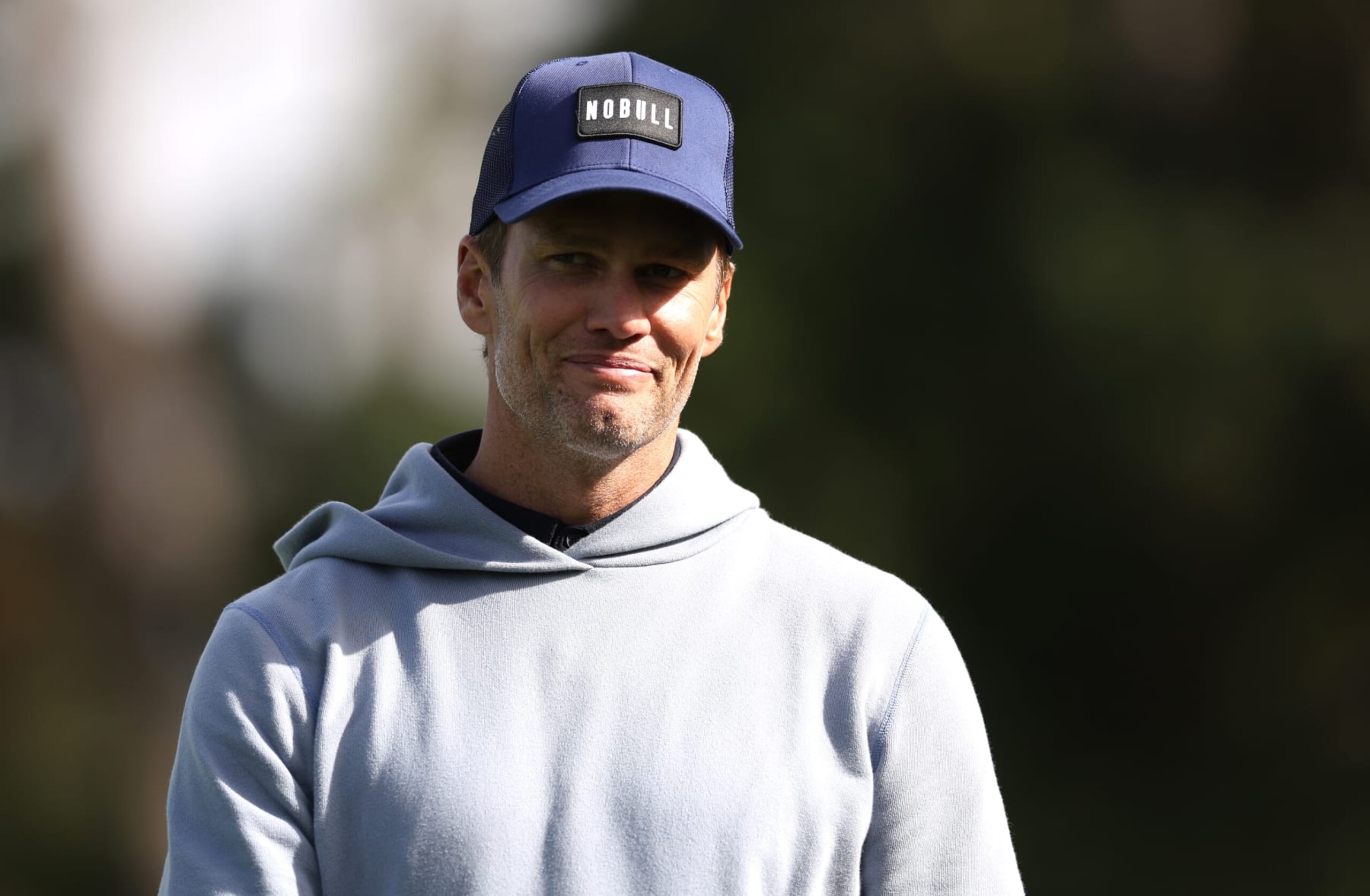 PEBBLE BEACH, CALIFORNIA - FEBRUARY 01: Former NFL quarterback Tom Brady looks on during the first round of the AT&T Pebble Beach Pro-Am at Pebble Beach Golf Links on February 01, 2024 in Pebble Beach, California. (Photo by Christian Petersen/Getty Images)