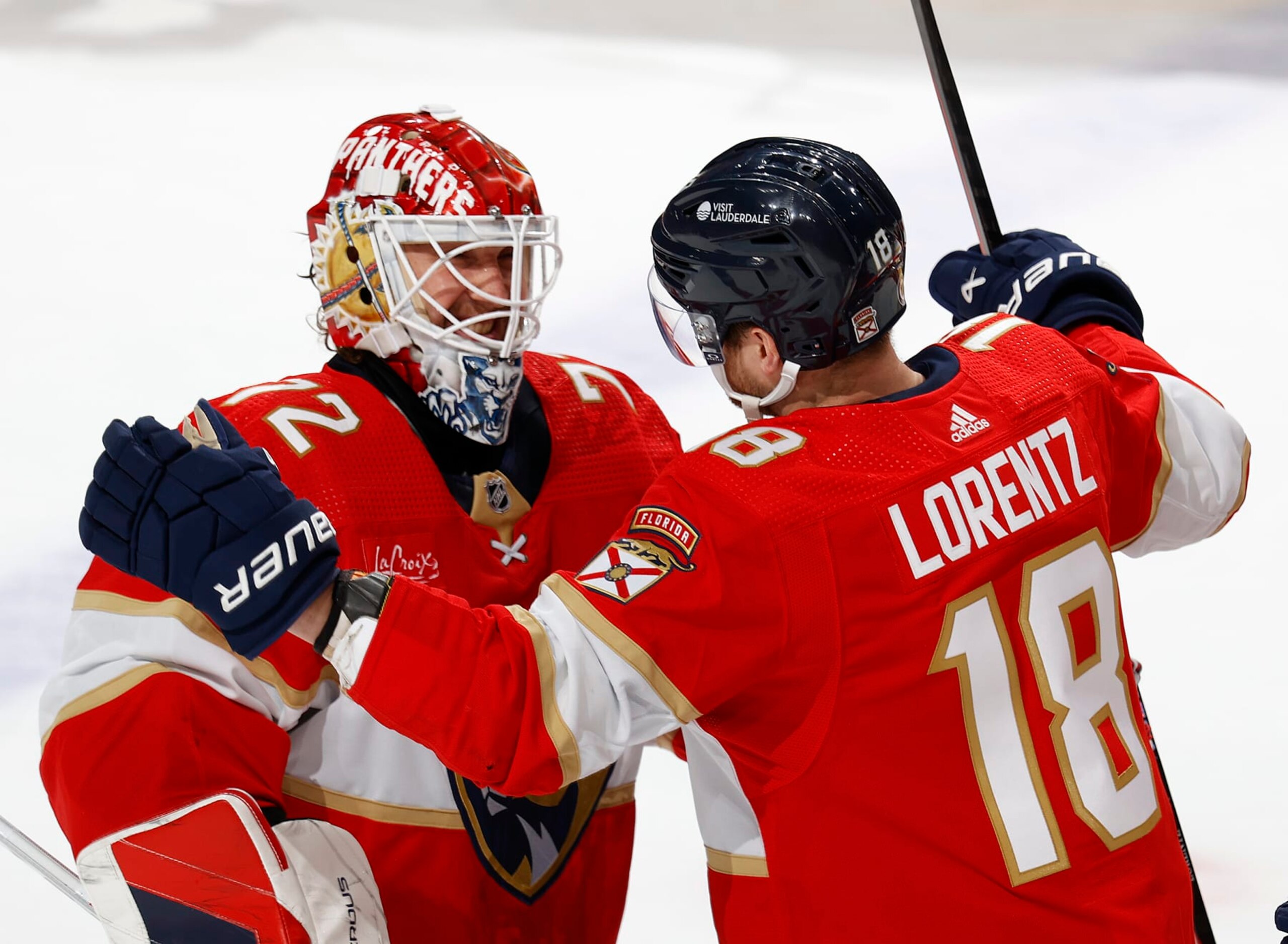 SUNRISE, FL - APRIL 13: Goaltender Sergei Bobrovsky #72 and Steven Lorentz #18 of the Florida Panthers celebrate the 3-2 overtime win against the Buffalo Sabres at the Amerant Bank Arena on April 13, 2024 in Sunrise, Florida. (Photo by Joel Auerbach/Getty Images)