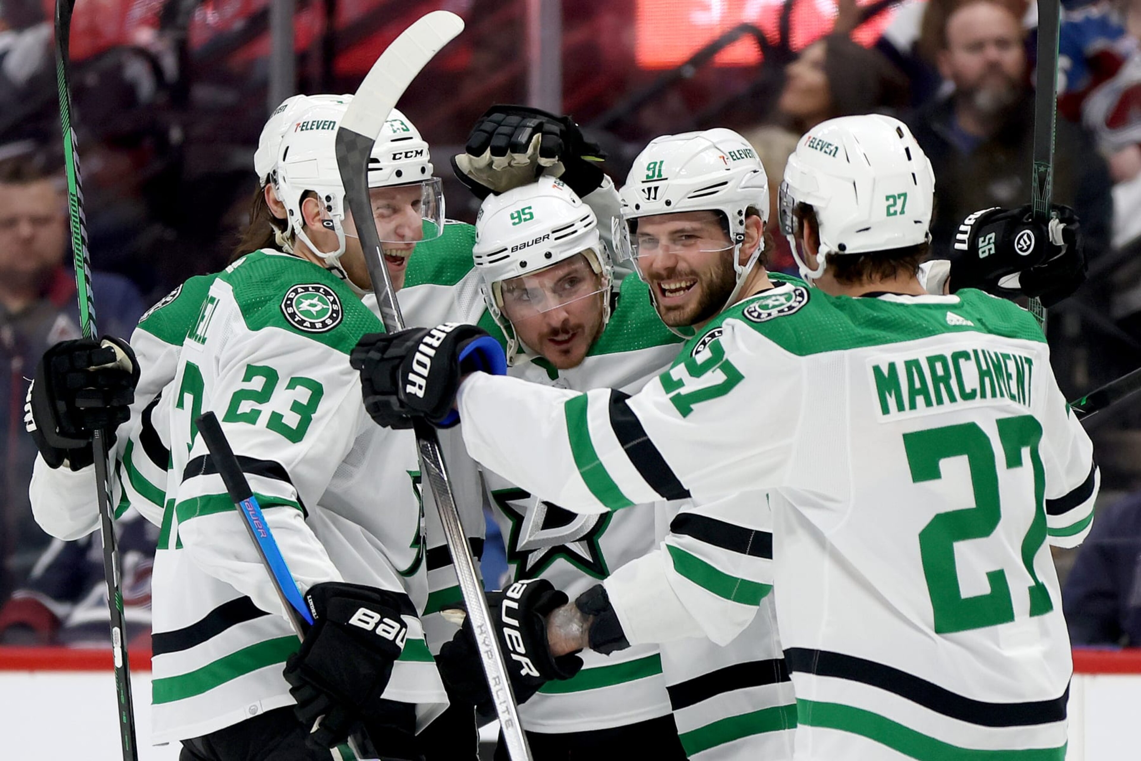 DENVER, COLORADO - APRIL 07: Matt Duchene #95 of the Dallas Stars celebrates with Chris Tanev #3, Esa Lindell #23, Tyler Seguin #91, and Mason Marchment #27 after scoring against the Colorado Avalanche during the first period at Ball Arena on April 07, 2024 in Denver, Colorado. (Photo by Matthew Stockman/Getty Images)
