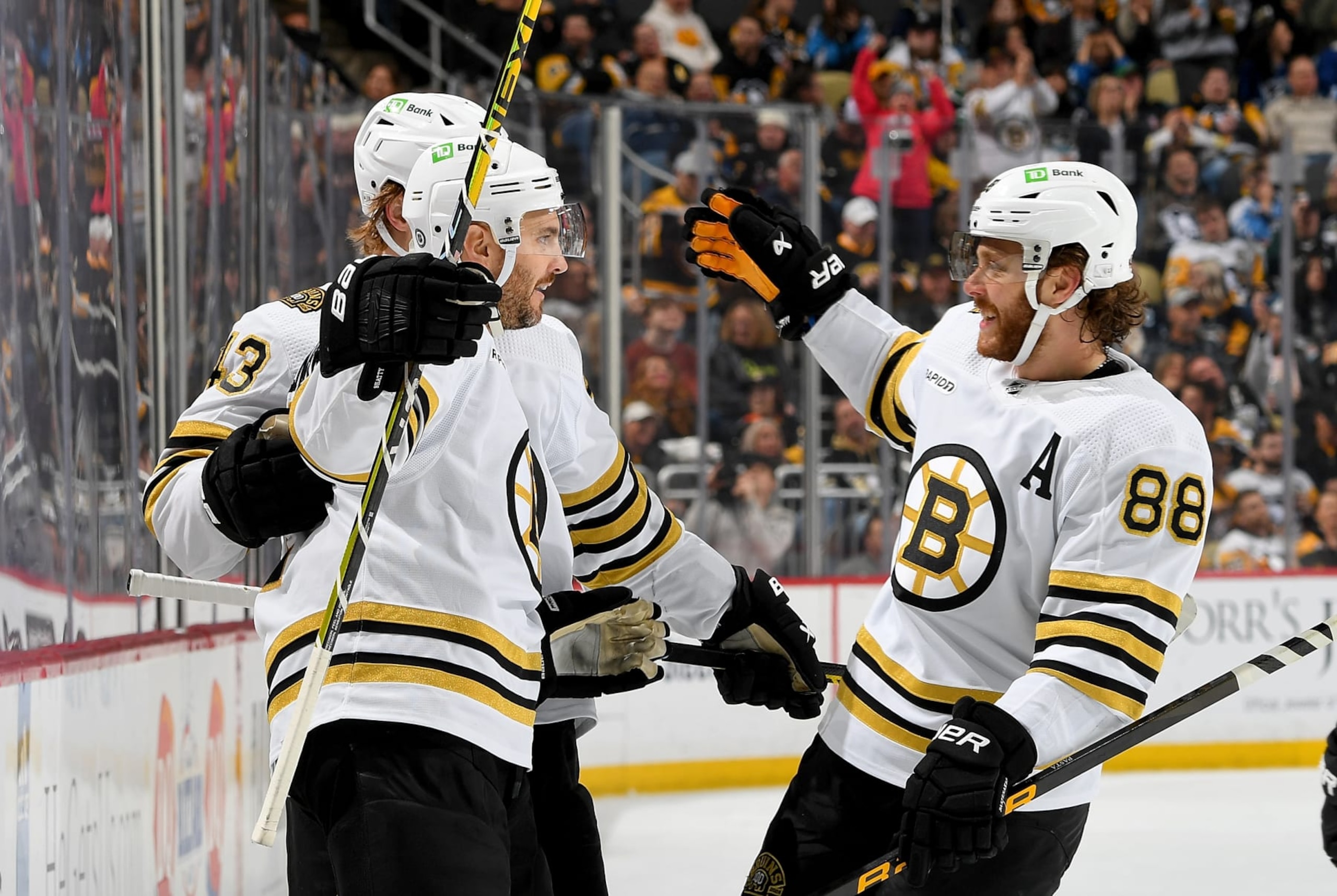 PITTSBURGH, PA - APRIL 13:  Kevin Shattenkirk #12 of the Boston Bruins celebrates his second period goal against the Pittsburgh Penguins at PPG PAINTS Arena on April 13, 2024 in Pittsburgh, Pennsylvania. (Photo by Joe Sargent/NHLI via Getty Images)