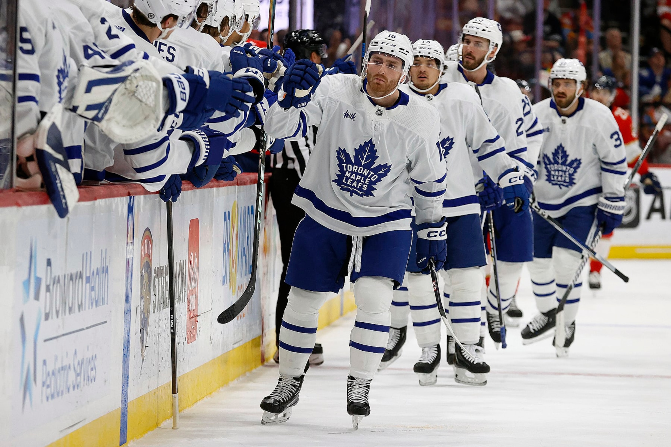 SUNRISE, FLORIDA - APRIL 16: Noah Gregor #18 of the Toronto Maple Leafs celebrates his goal with teammates during the first period against the Florida Panthers at the Amerant Bank Arena on April 16, 2024 in Sunrise, Florida. (Photo by Eliot J. Schechter/NHLI via Getty Images)